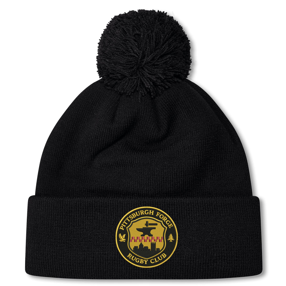 The Pittsburgh Forge Pom Pom Beanie by Canterbury features a black knit design, cuff logo patch, and pom-pom on top—an EMB Canterbury custom rugby hat inspired by the classic Canterbury Rugby Beanie style.