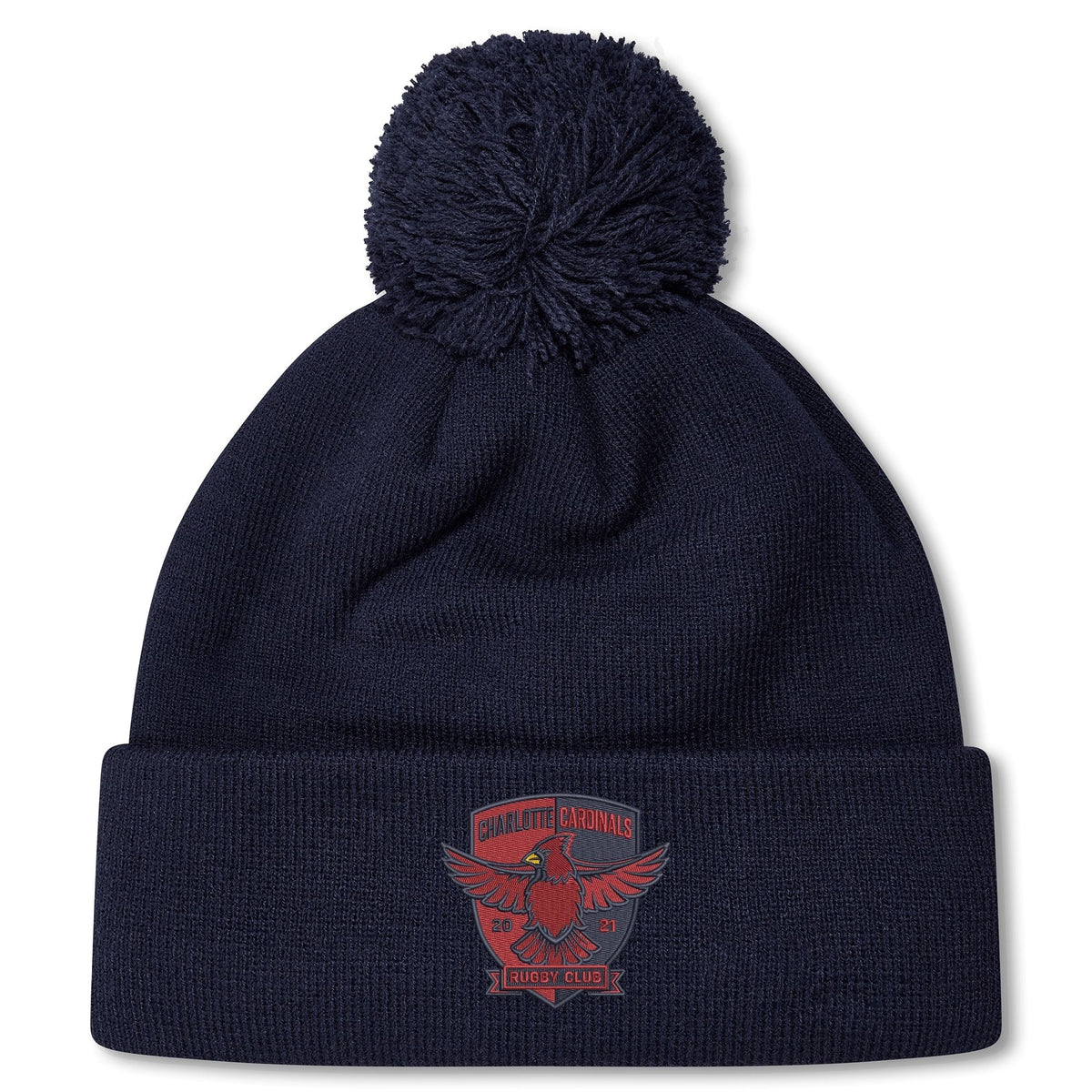 Stay warm with the Charlotte Cardinals Rugby Club Pom Pom Beanie by Canterbury—navy blue, fleece-lined, with a red club logo on the front cuff. The perfect rugby bobble hat from EMB Canterbury.