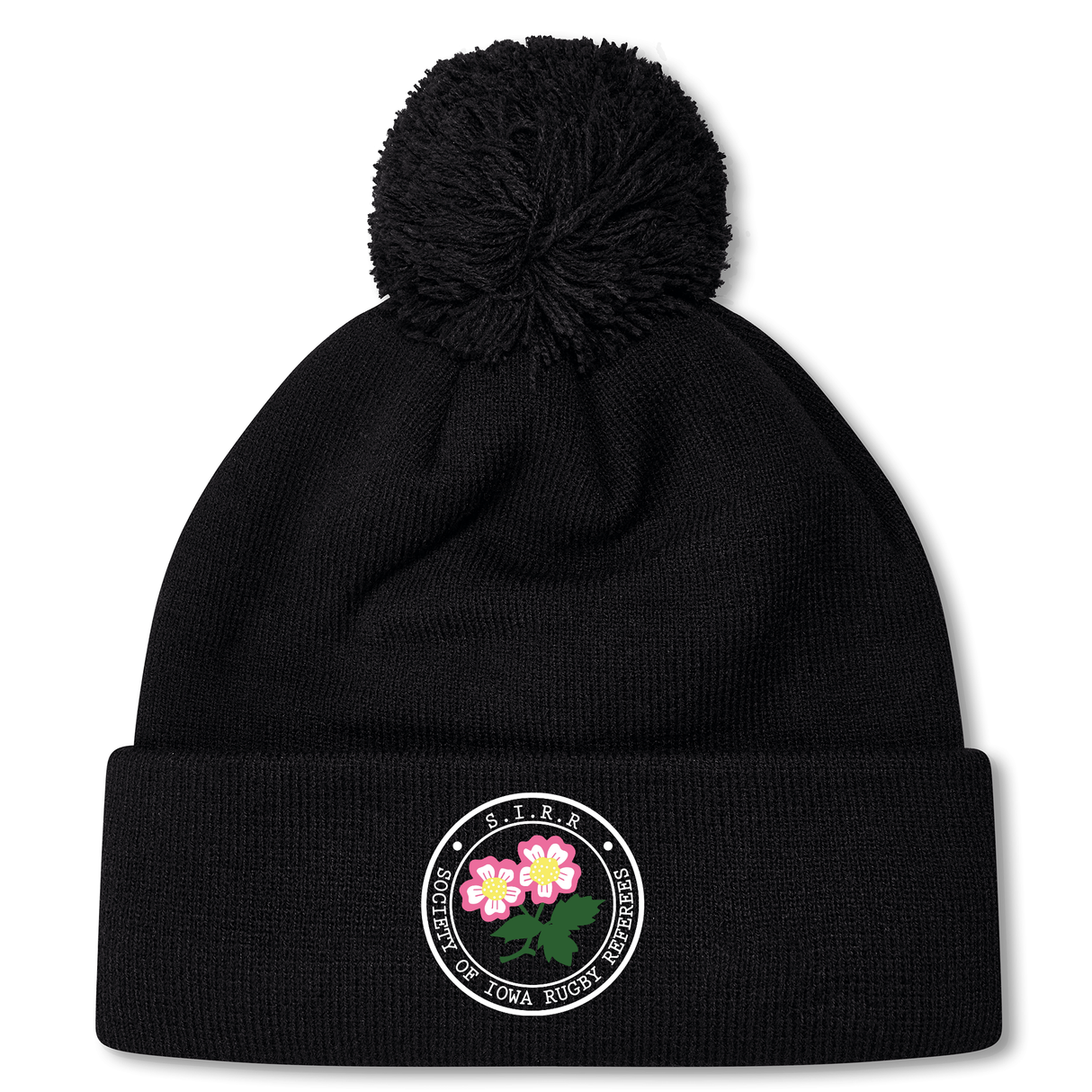 The Society of Iowa Rugby Referees Pom Pom Beanie by EMB Canterbury is a black knit fleece-lined beanie topped with a pom-pom, featuring a circular embroidered patch with two pink flowers and border text, combining cozy comfort with the classic rugby beanie style.