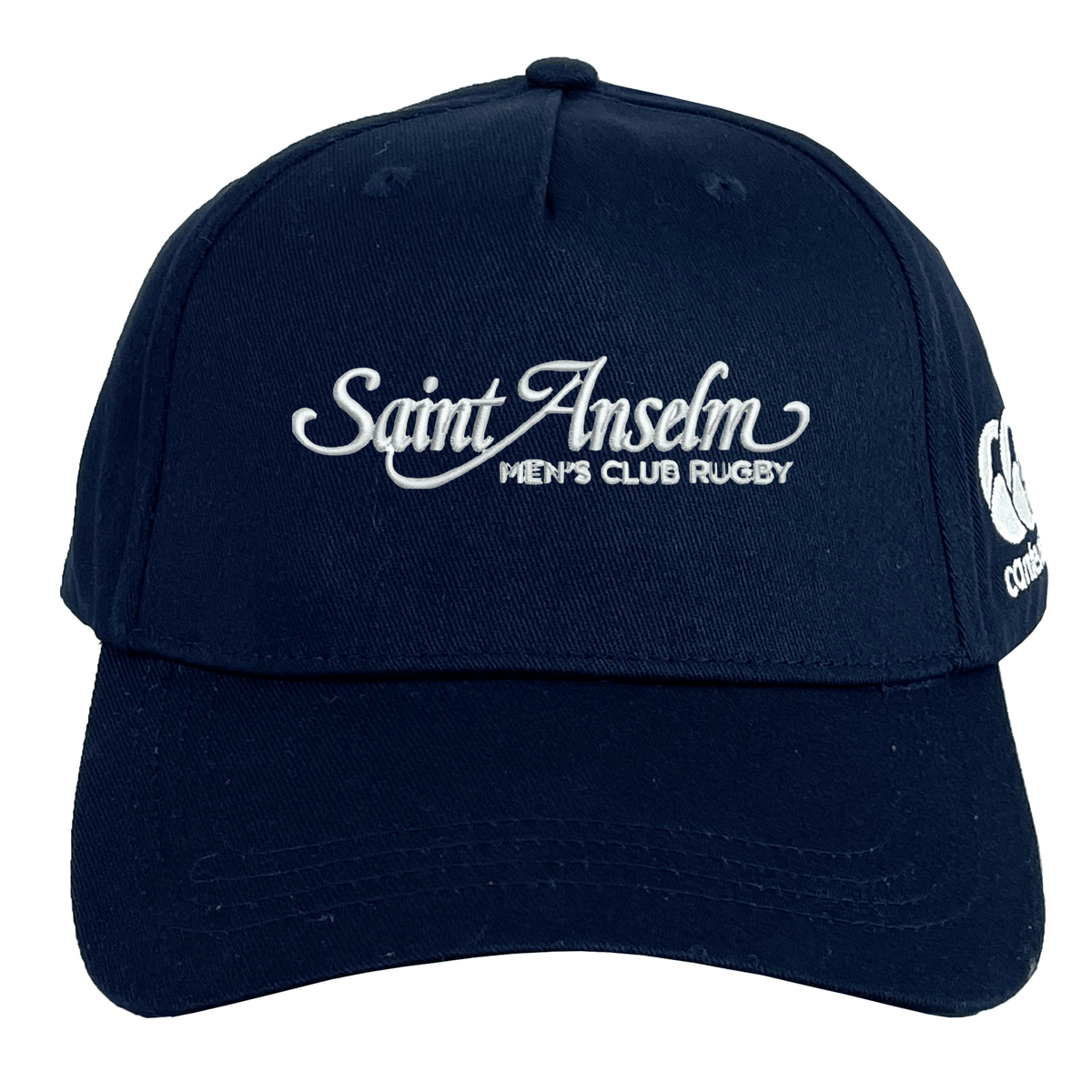 The Saint Anselm College Club Rugby Flexfit Drill Cap by Canterbury features "Saint Anselm Men's Club Rugby" embroidered on the front and a white logo on the side. Brand: EMB Canterbury. Navy blue color.