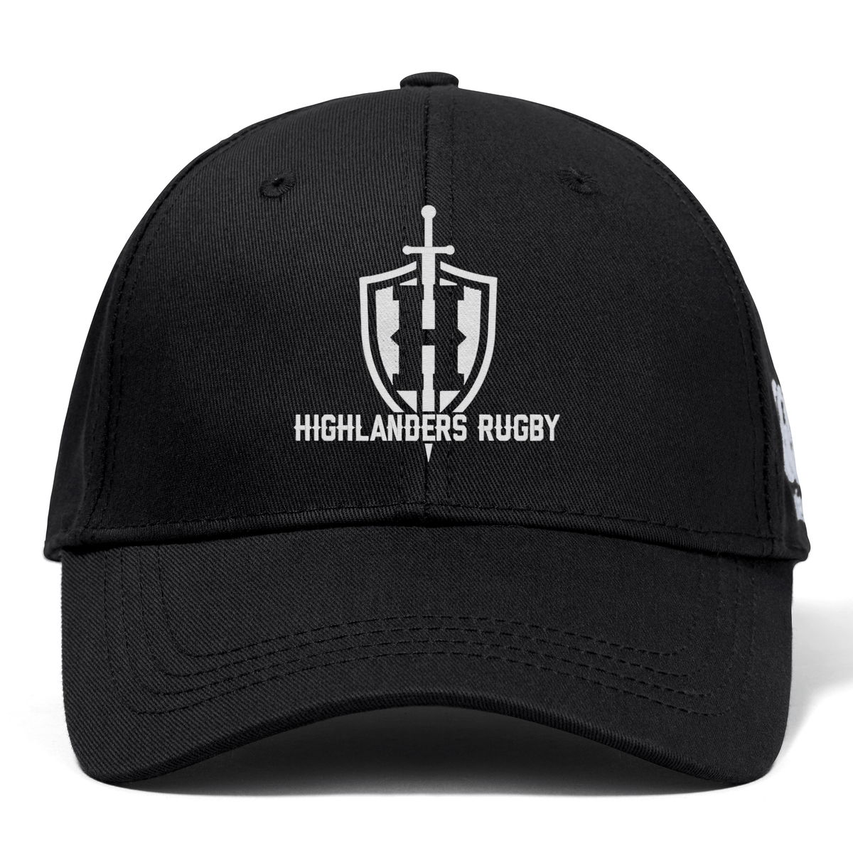 The Highlanders Rugby NC Flexfit Drill Cap by Canterbury is a black baseball cap from EMB Canterbury, showcasing the Highlanders Rugby logo with a sword and shield design above the text "Highlanders Rugby." This comfortable flex fit cap ensures a snug and stylish wear for dedicated fans.