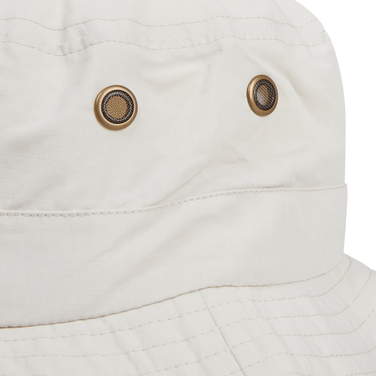 Close-up of the British & Irish Lions 2025 Outback Wide Brim Bucket Hat by Canterbury in beige, showcasing two metal eyelets on the side. Crafted from quick-dry ripstop polyester, it captures the adventurous spirit reminiscent of the British & Irish Lions.