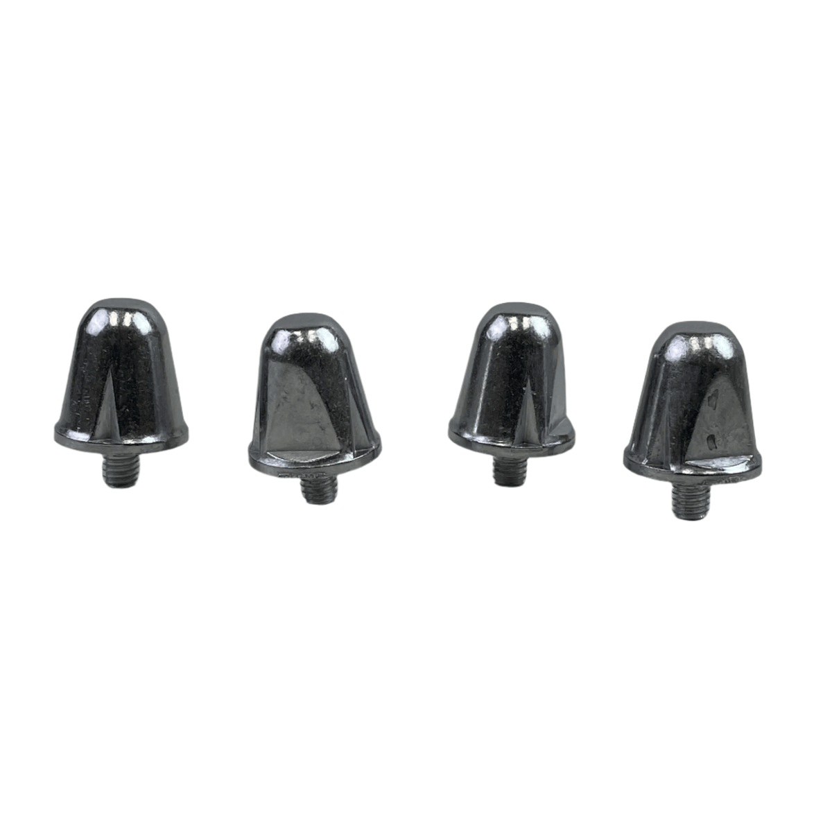 Four Stampede Performance Studs by Canterbury, featuring shiny metal cone-shaped designs with threaded bases, rest on a white surface, ready to boost rugby players' agility on soft ground.
