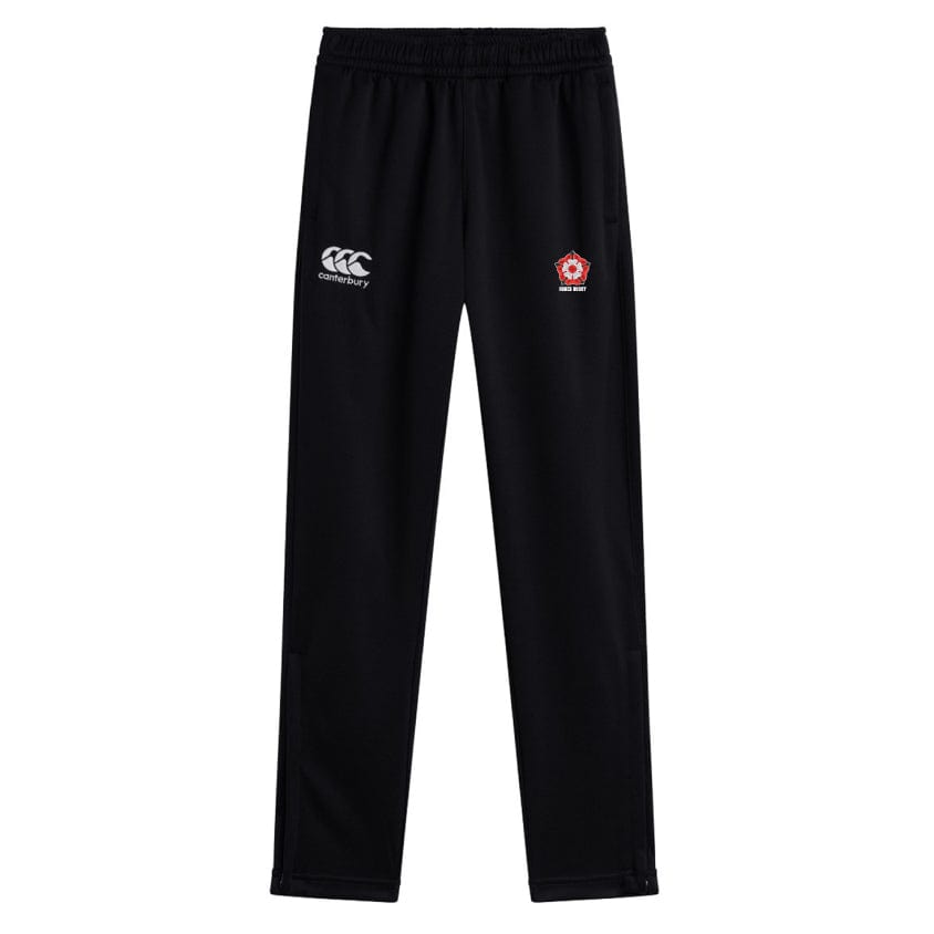 Black workout pants with a comfortable elastic waistband, featuring a white EMB Canterbury logo and a red and white emblem. The Roses Rugby Stretch Tapered Pant by Canterbury is designed for performance, offering quick-dry fabric to keep you fresh during intense sessions.