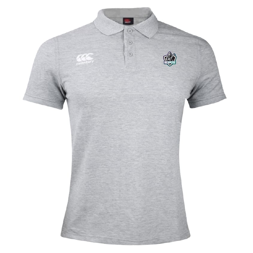The South Reapers Waimak Polo by EMB Canterbury is a light grey polo made from a comfy cotton-poly blend, featuring a small embroidered logo on the left chest and a white Canterbury logo on the right chest.