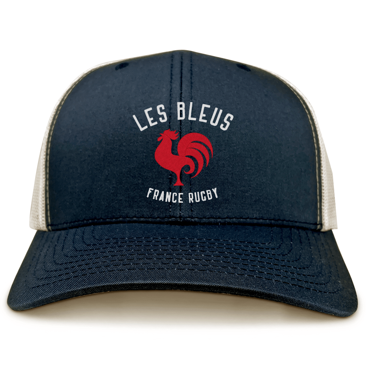 The Les Bleus France Rugby Retro Trucker Cap by EMB S&S Activewear features a bold red rooster graphic and “LES BLEUS” and “FRANCE RUGBY” text on navy blue and beige, perfect for France Rugby fans.
