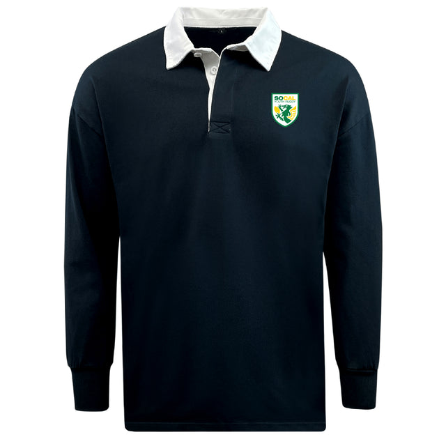 The EMB Mudoo SoCal Youth Referees Classic Long Sleeve Solid Rugby Jersey features a black design, white collar, and green and yellow lion crest on the left chest. Crafted from cotton, it blends classic rugby style with comfort.