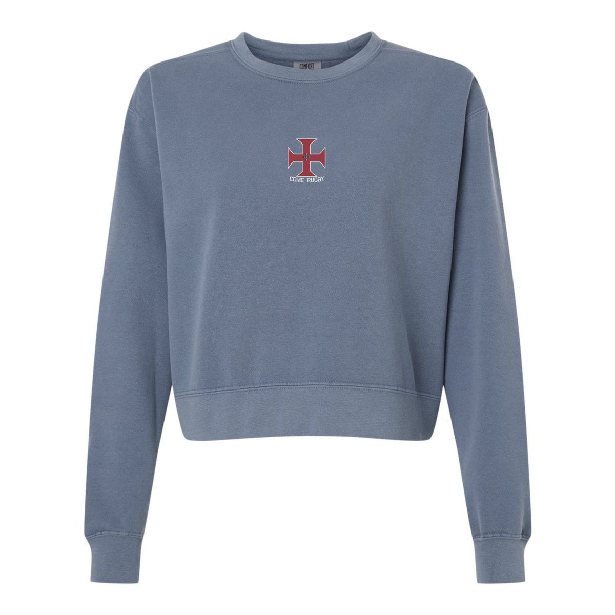 The SF CDME Rugby Women’s Garment-Dyed Mid-Length Crewneck Sweatshirt by EMB S&S Activewear features a blue, heavyweight fleece construction for a cozy feel, and showcases a small red and white cross emblem along with the text “ONE STAR” centered on the chest.
