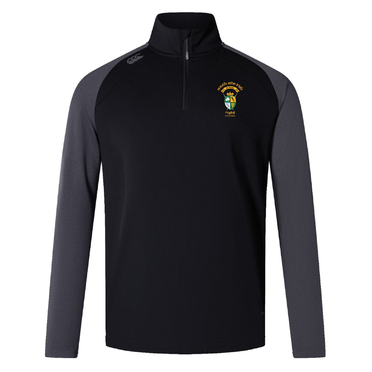 The South Side Irish 50th Anniversary Elite First Layer by EMB Canterbury is a black and gray long-sleeve training top with an embroidered crest, yellow left chest text, and a stand-up collar.
