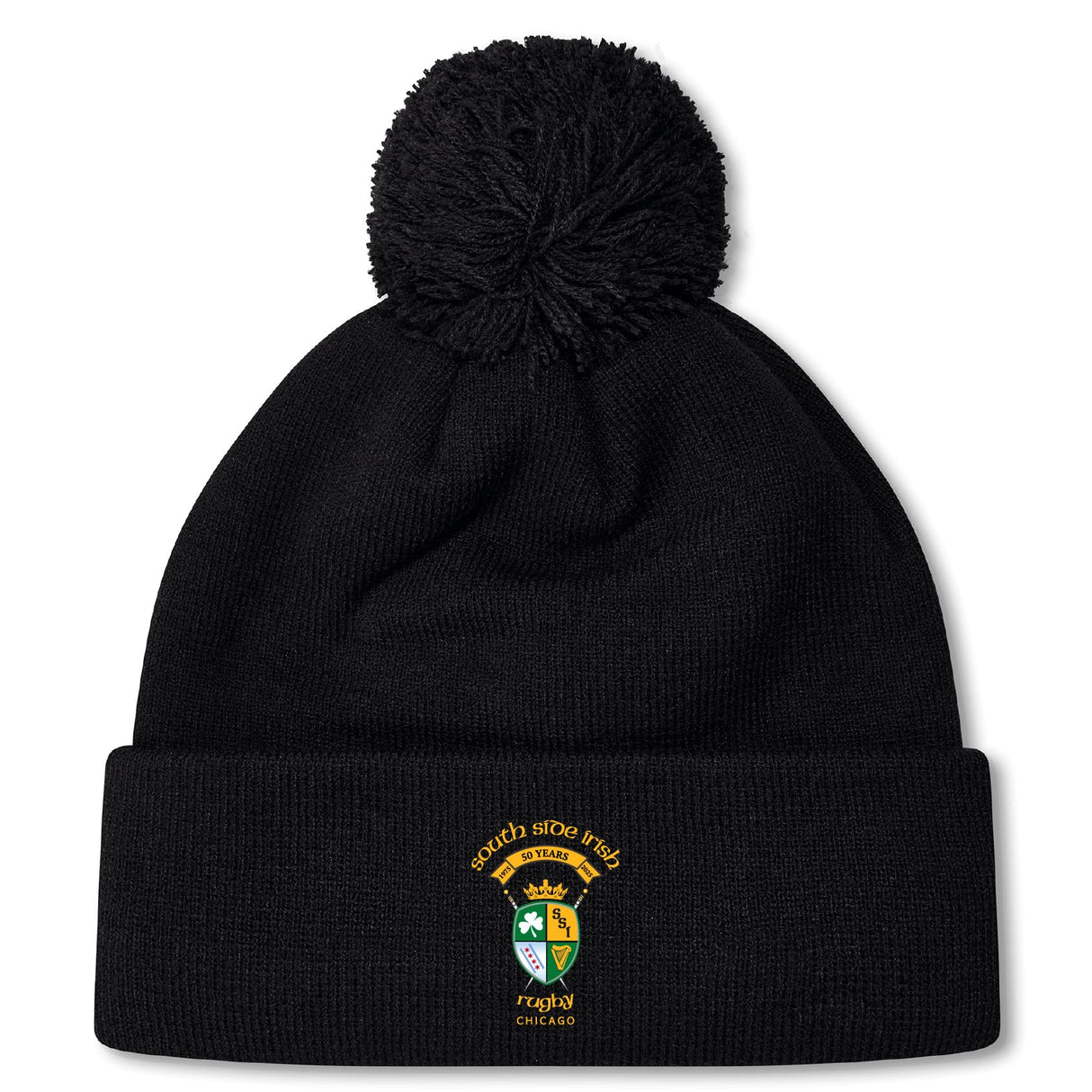 The South Side Irish 50th Anniversary Pom Pom Beanie by EMB Canterbury features a black knit, fleece lining for warmth, a large pom-pom, and an embroidered South Side Irish Rugby Chicago crest on the front cuff.