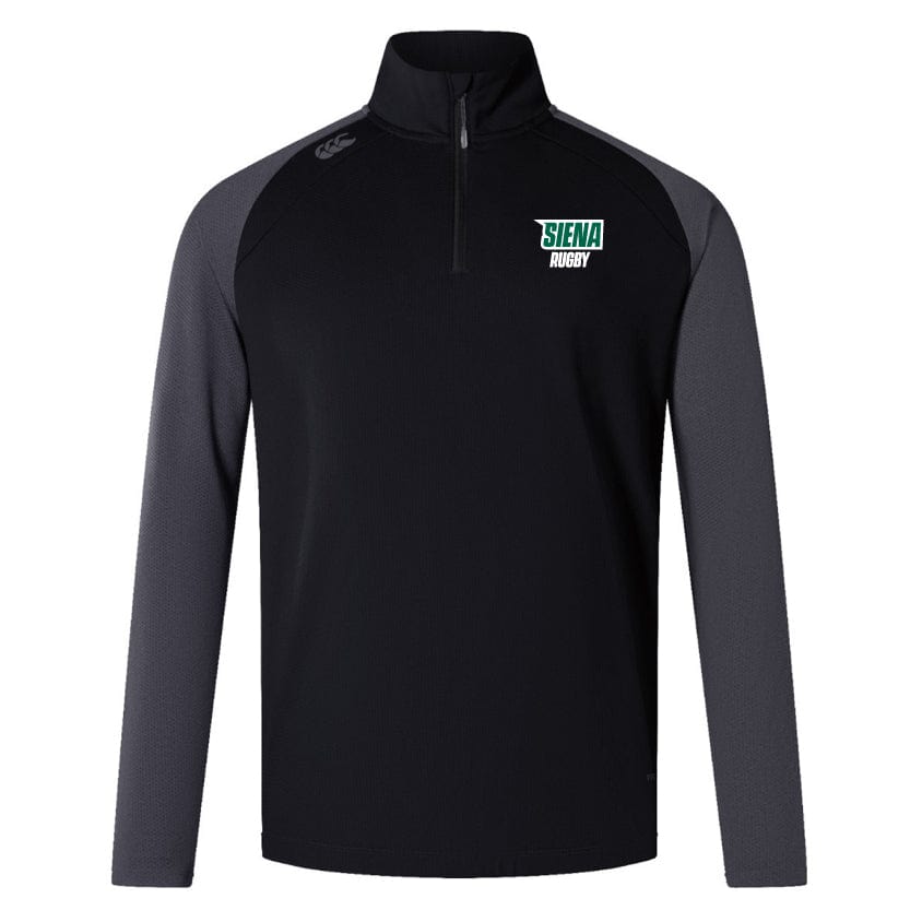 The Siena College Women's Elite First Layer from EMB Canterbury is a black and gray long-sleeve pullover featuring "Siena Rugby" on the chest and a small logo on the shoulder, crafted with honeycomb fabric and VapoDri technology for top-tier comfort.