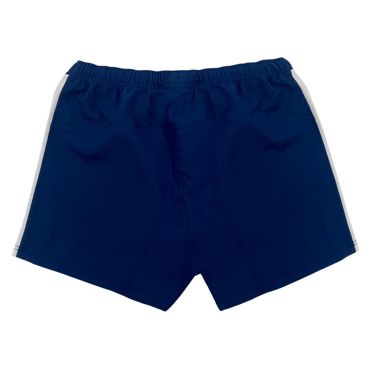 The Women’s USA Rugby 23/24 Pro Home Shorts by Castore feature a navy blue design with an elastic waistband and white side stripes, shown from the back against a white background.