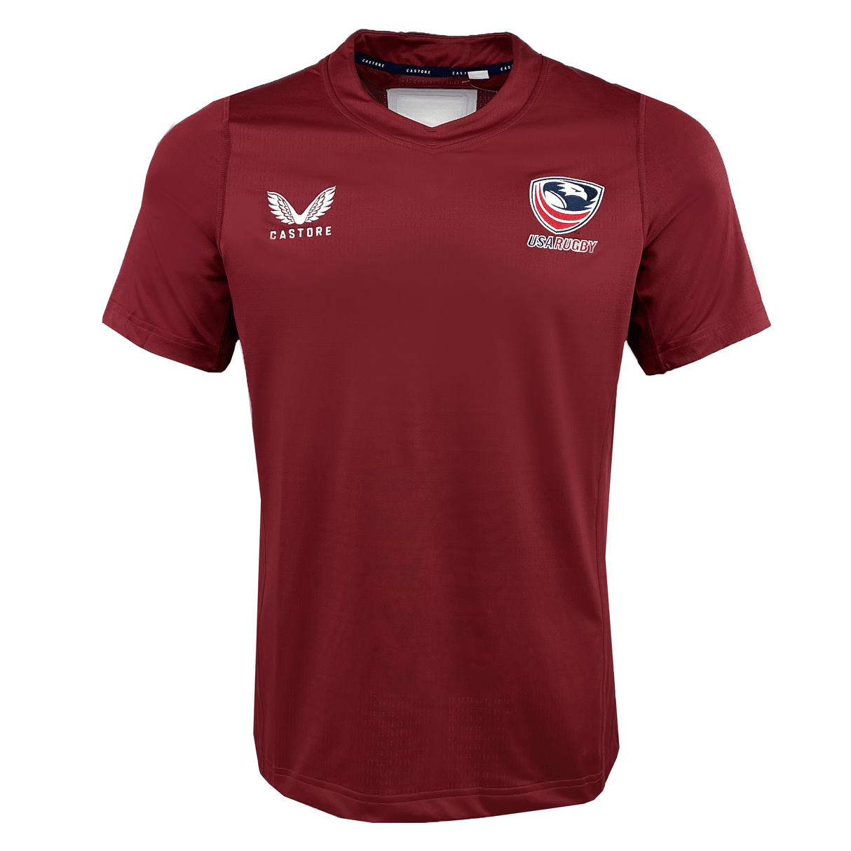 Cheer on Team USA or train in style with the Castore Women's USA Rugby 24/25 Pro Training Jersey in red, featuring a v-neck, short sleeves, Castore logo on the right chest, and the US Rugby shield on the left.