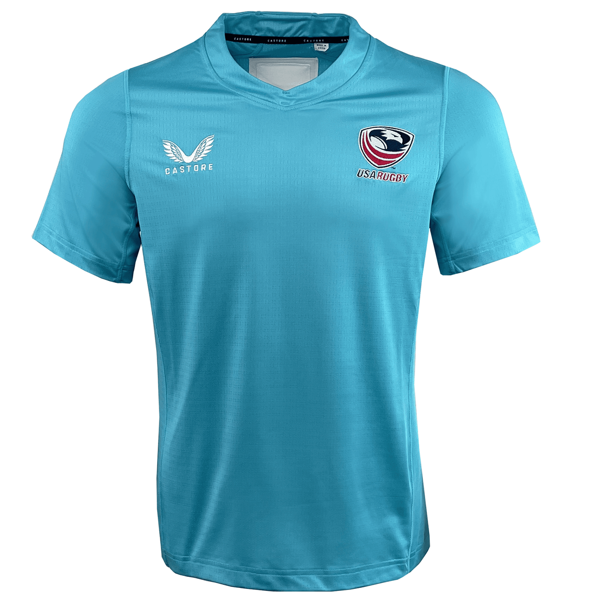 The Women's USA Rugby 24/25 Pro Training Jersey by Castore in blue features the Castore logo on the right chest and USA Rugby emblem on the left, designed for high performance and comfort.