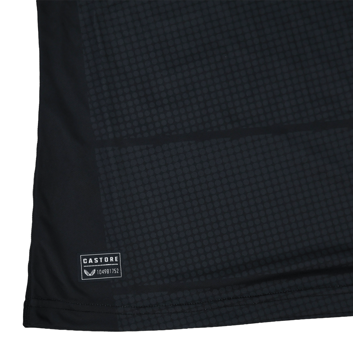 Close-up of the Women's Saracens 24/25 Home Replica Jersey by Castore, a black rugby jersey with a subtle square grid pattern and a small Castore label near the hem.