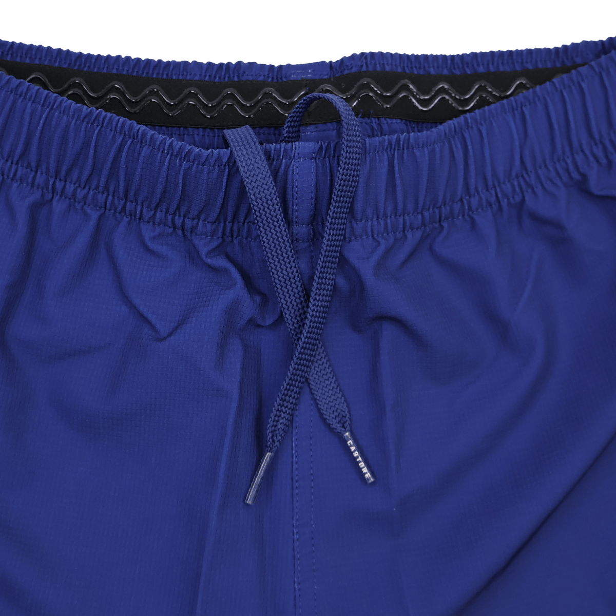 Close-up of the waistband and drawstring on the Leinster 25/26 Home Pro Short by Castore, featuring a royal blue ripstop fabric, elastic band, and black silicone grip inside.