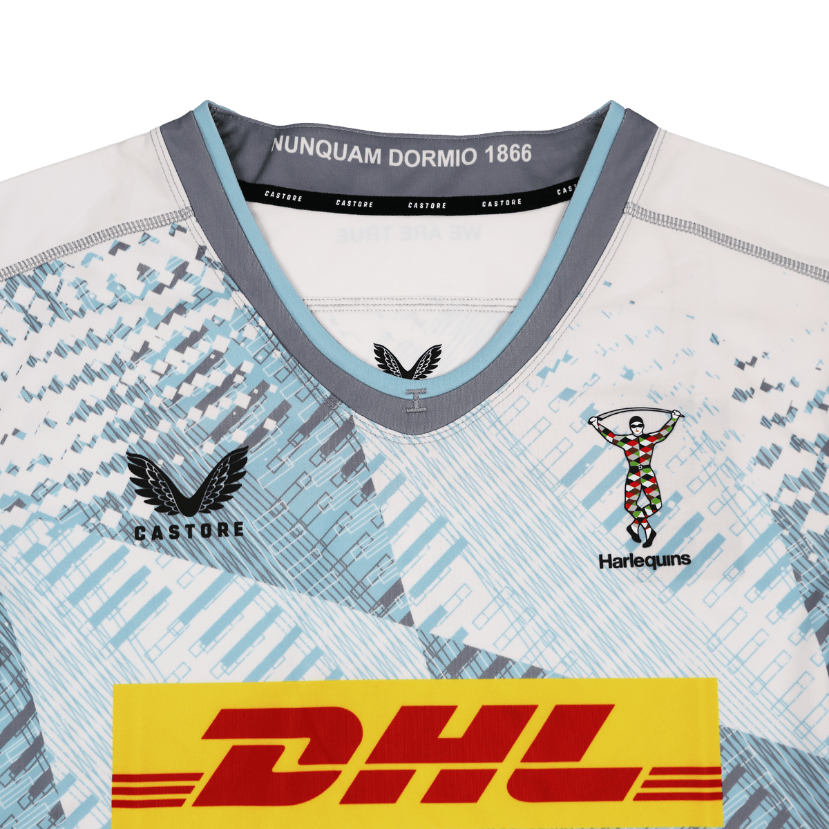 Close-up of the Harlequins 22/23 Replica Away Jersey by Castore, showing the Castore logo, Harlequins crest, DHL sponsor, and "NUNQUAM DORMIO 1866" inside the collar.
