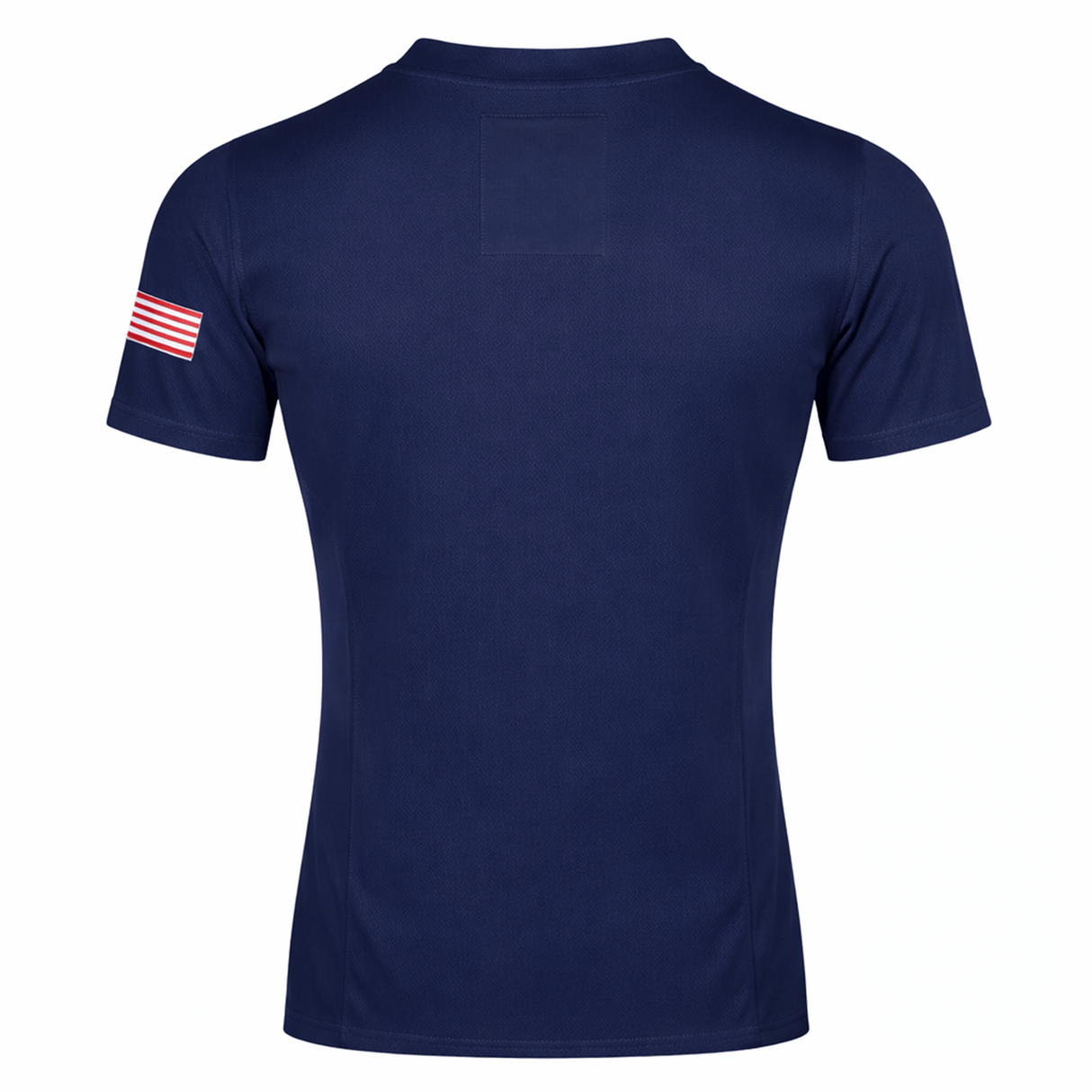The USA Rugby 23/24 Training Jersey by Castore is a navy blue short-sleeve rugby shirt shown from the back, featuring a small American flag patch on the right sleeve. Its moisture-wicking fabric is ideal for training or daily wear.