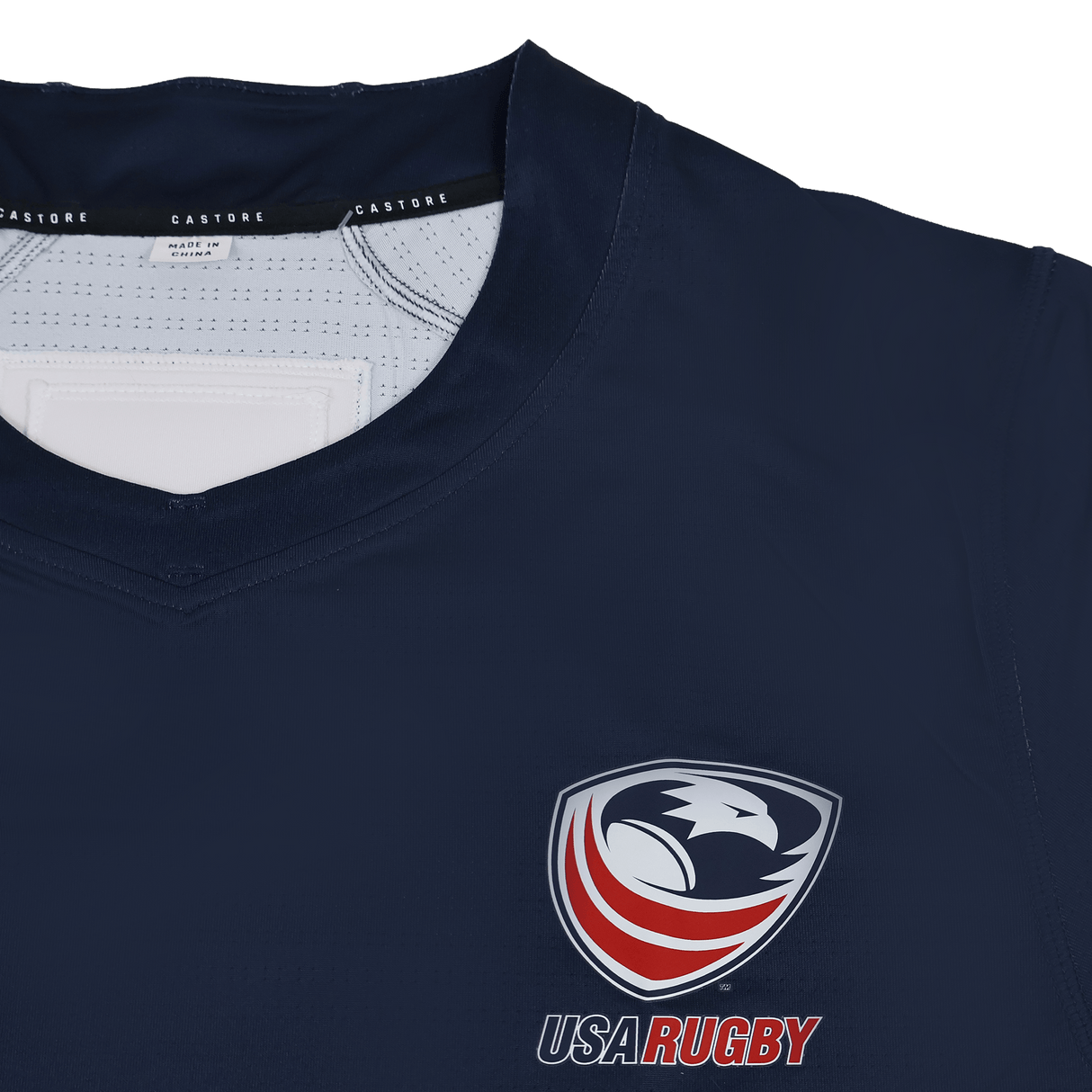 The USA Rugby 23/24 Training Jersey by Castore is a navy blue top featuring the eagle logo on the chest and Castore branding inside the collar.