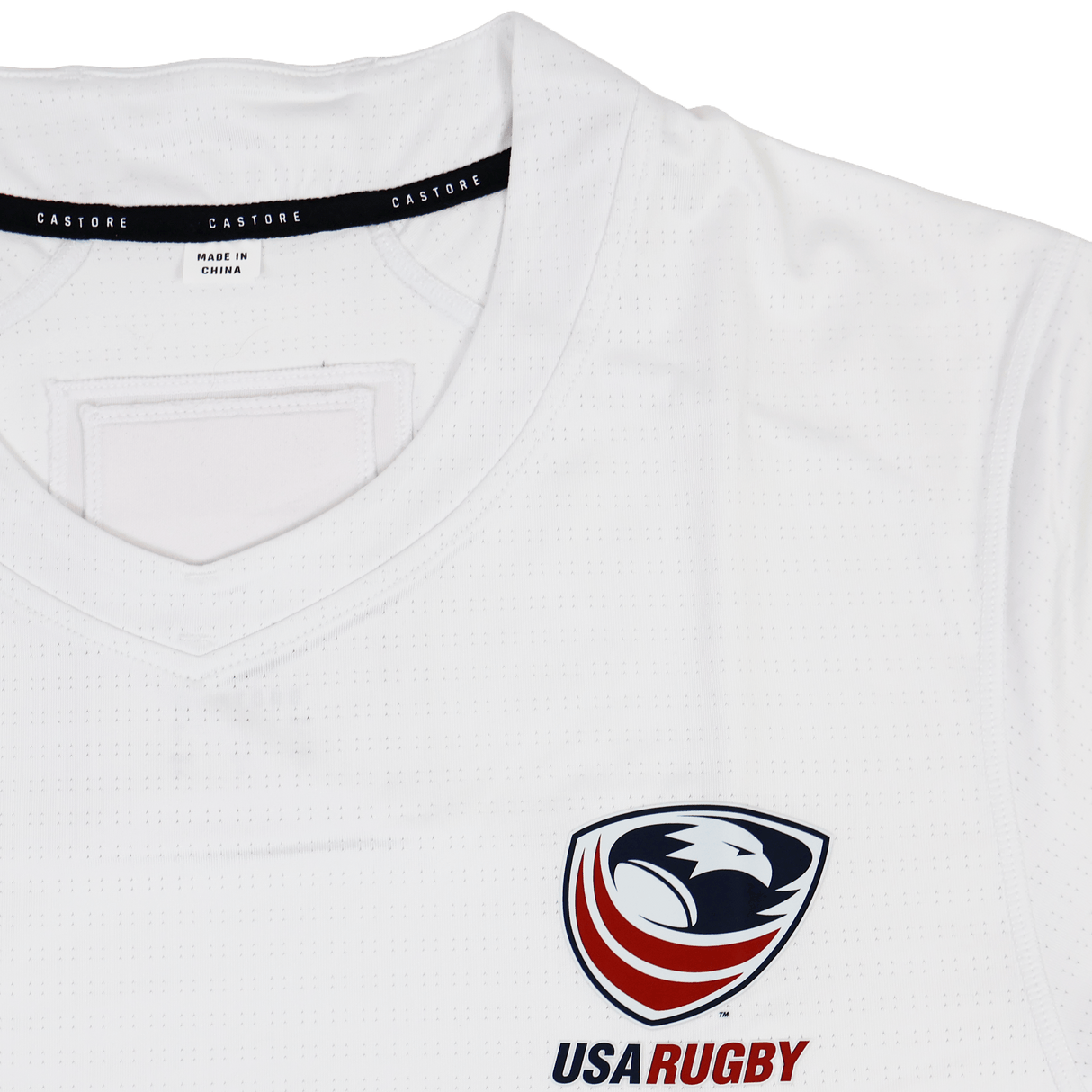 Close-up of the USA Rugby 23/24 Training Jersey by Castore, a white training top with Castore branding and an eagle logo on the chest.
