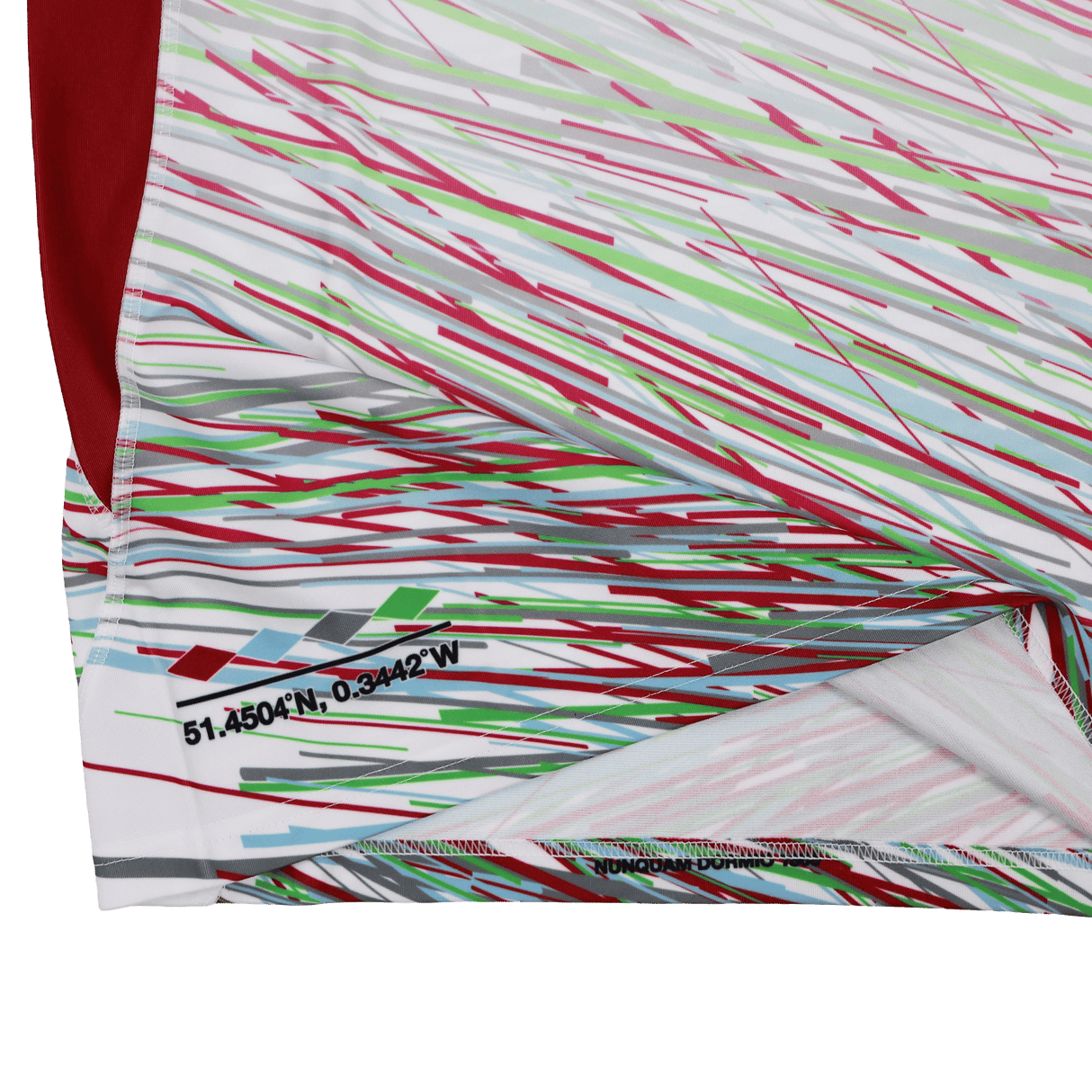 Close-up of the Castore Harlequins 23/24 Replica Away Jersey fabric, featuring red, green, and blue diagonal lines and "51.4504°N, 0.3442°W" coordinates printed in black.