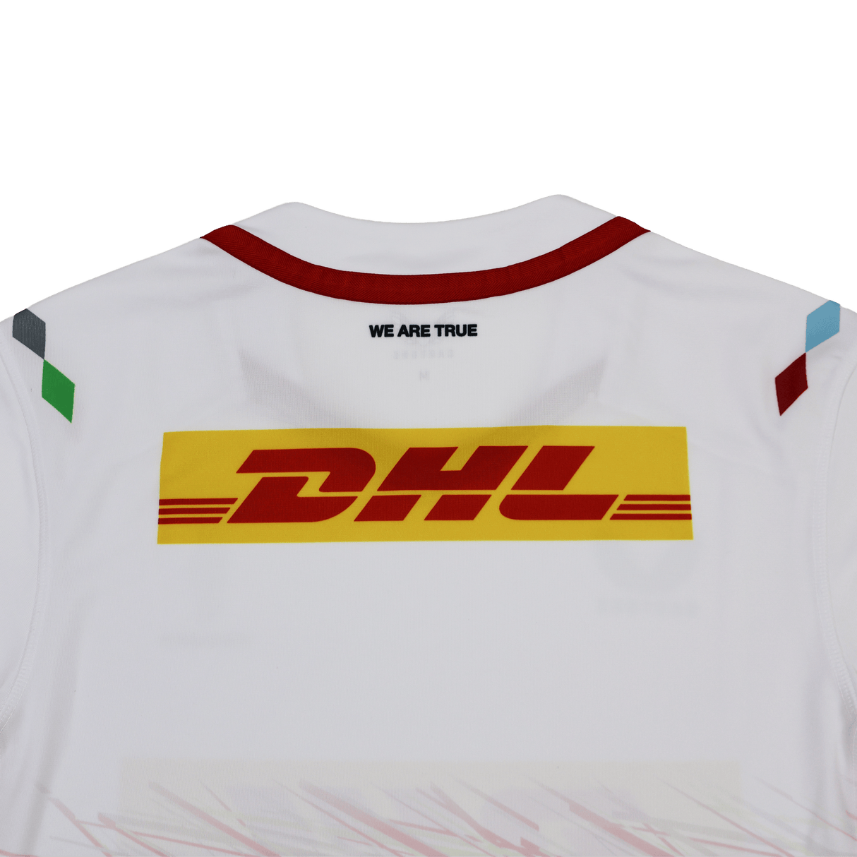 Back view of the Harlequins Replica Away Jersey 23/24 by Castore in white, featuring a yellow DHL logo and "WE ARE TRUE" below the collar, plus colored shoulder accents—a stylish fan jersey from Castore.