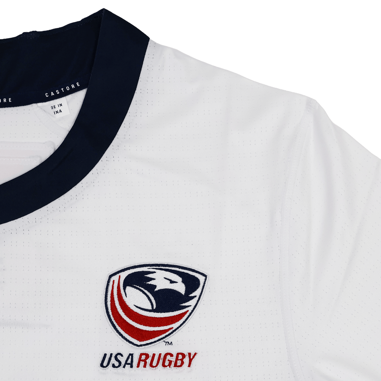 The USA Rugby 24/25 Pro 7s Away Jersey by Castore is a white jersey with a navy collar, featuring the USA Rugby logo and "USA RUGBY" text on the chest.