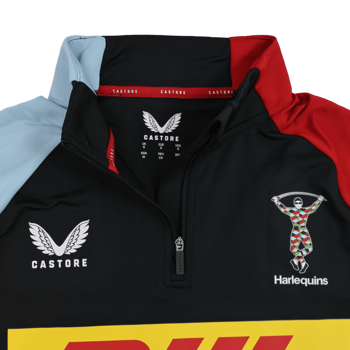 Close-up of the Harlequins 24/25 Matchday 1/4 Zip Midlayer by Castore, showcasing sponsor logos, a quarter-zip collar, and a bold multicolored panel design.