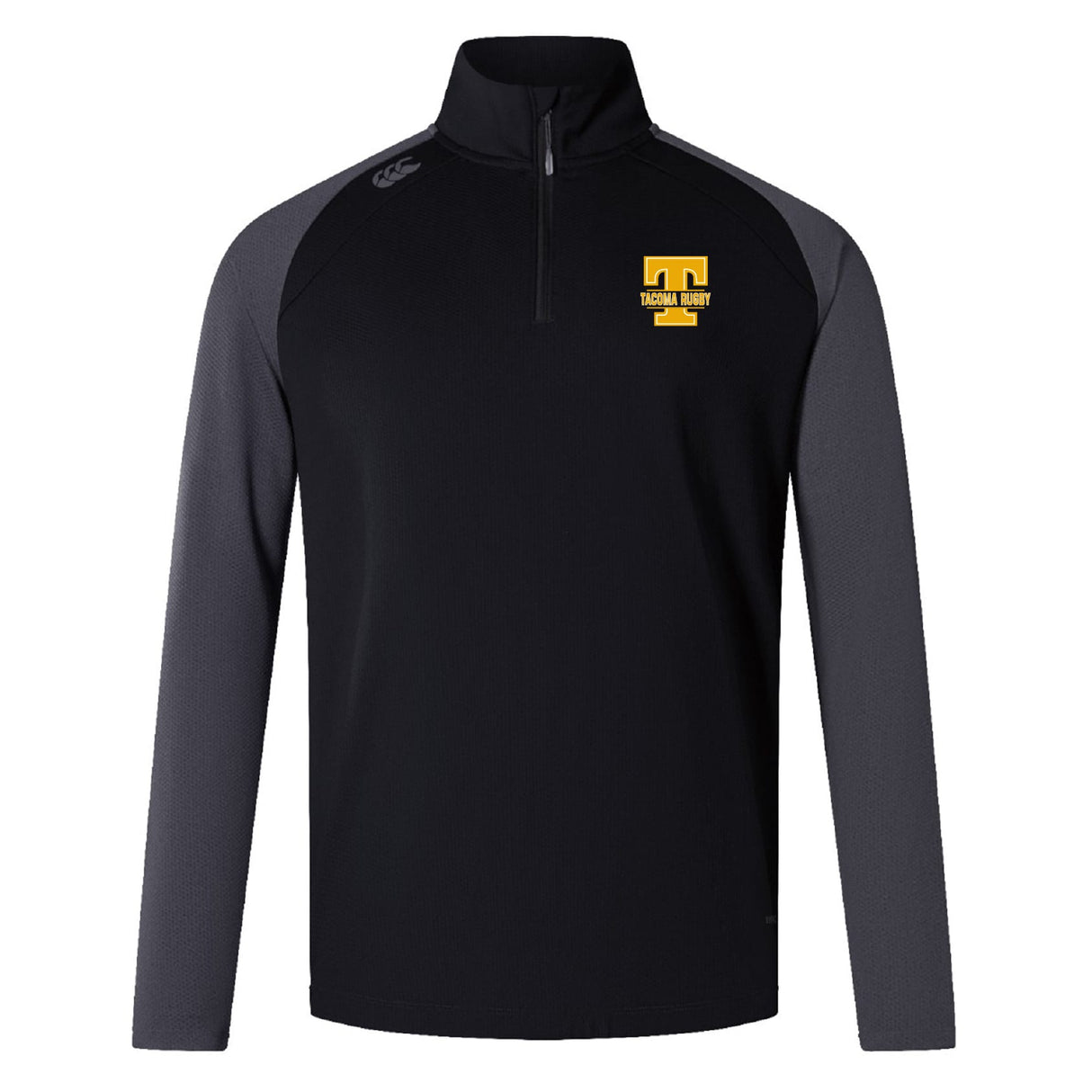 The Tacoma Tsunami Rugby Women's Elite First Layer by EMB Canterbury is a black and gray long-sleeve quarter-zip pullover with VapoDri moisture wicking, a yellow "TACOMA RUGBY" logo on the left chest, and a small white logo on the right shoulder.