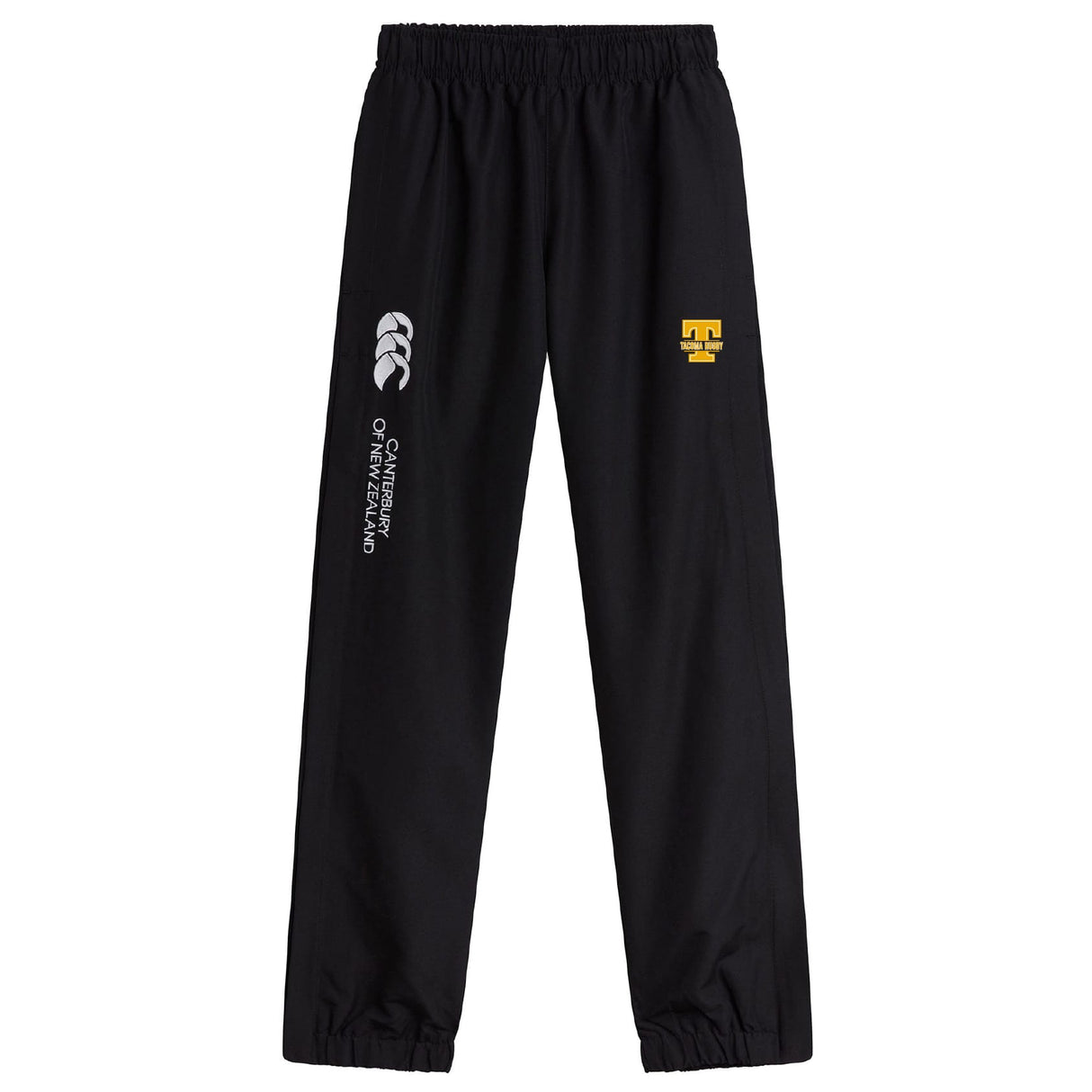 The Tacoma Tsunami Rugby Cuffed Hem Stadium Pant by EMB Canterbury features a black design, elastic waistband and cuffs, white "Canterbury of New Zealand" text on the left leg, and a yellow "T" logo on the right leg—perfect for men's rugby style.