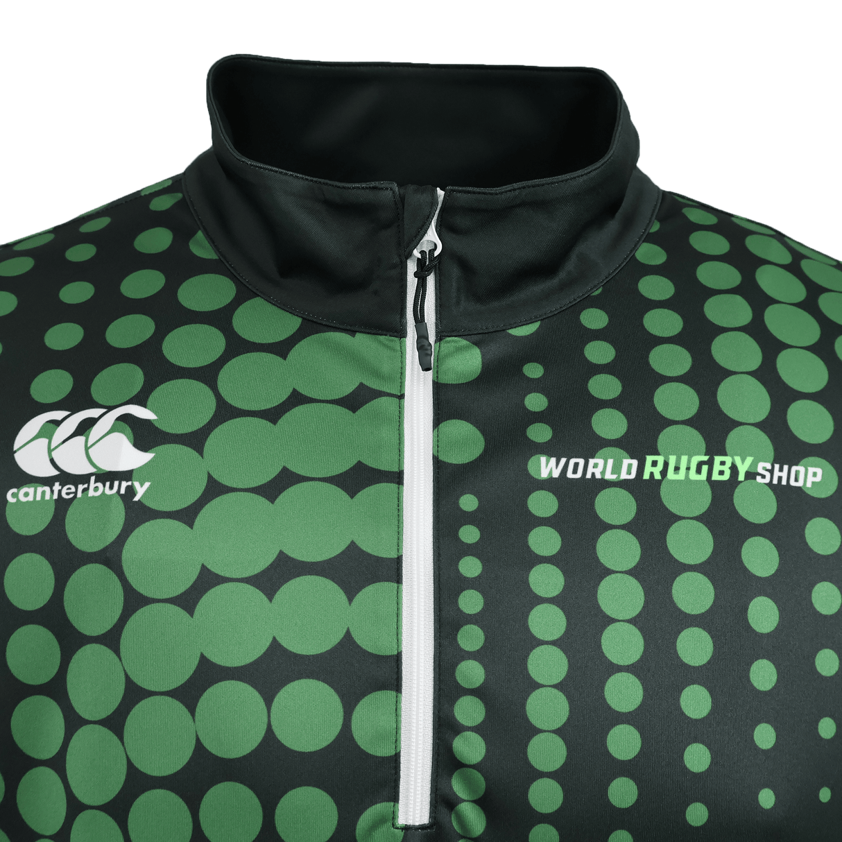 The Teamatical Canterbury Eco-Sublimate Mid-Layer Q-zip for men features a green and black design with large sublimated dots, a quarter zip collar, Canterbury logo left, and "World Rugby Shop" on the right.