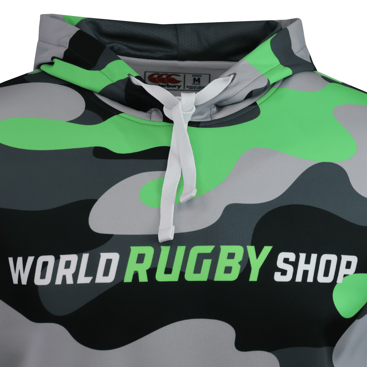 A close-up of the Teamatical Canterbury Mid-Layer Sublimate Hoodie for men, featuring a camo pattern and bold white and green "WORLD RUGBY SHOP" text across the chest.