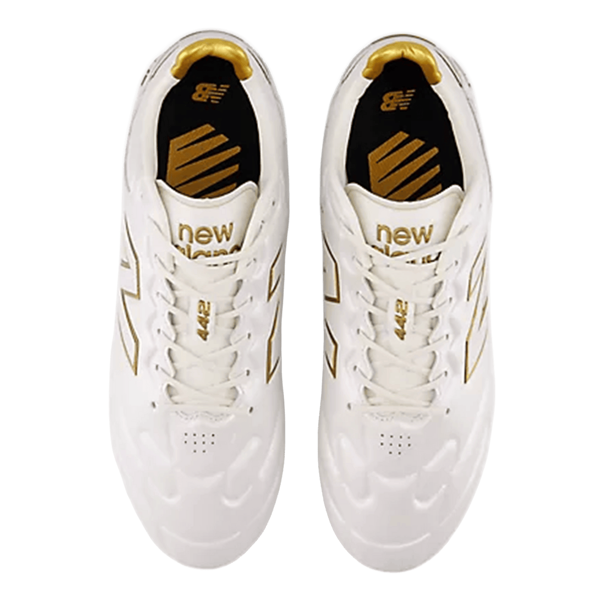 Top view of New Balance Wide 442 Elite FG v3 soccer cleats in Sea Salt/Gold Metallic, featuring gold accents and branding on the tongues and insoles, designed for firm ground play.