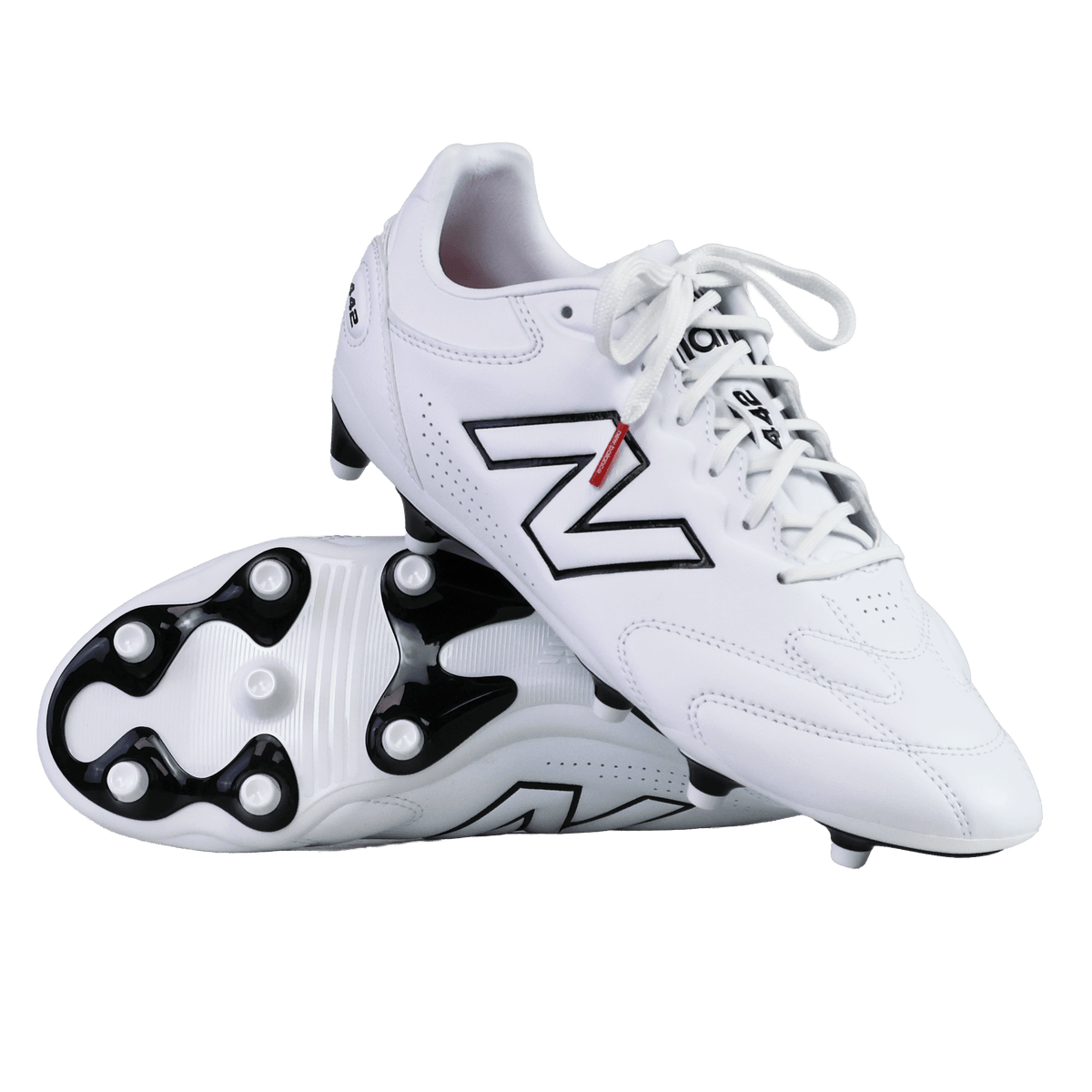 A pair of New Balance 442 Pro FG v3 Rugby Boots in white and black, featuring subtle red accents and a premium True Touch upper for enhanced control. Designed for firm ground play, these boots include black soles with white studs, all showcased against a clean white background.