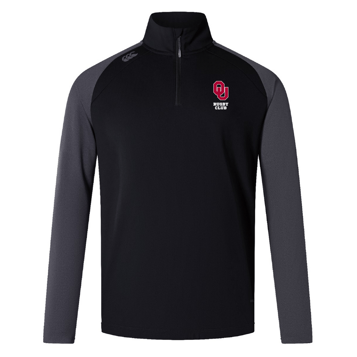 The University of Oklahoma Women Elite First Layer by EMB Canterbury is a black and gray quarter-zip pullover with the AJ Hurling Club logo, using VapoDri technology for breathability, perfect as training attire that blends style and performance.