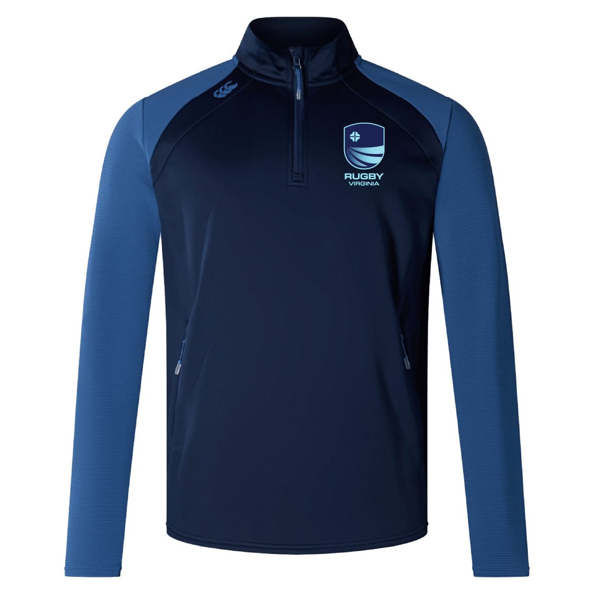 The EMB Canterbury Rugby VA Elite First Layer is a navy and royal blue quarter-zip pullover with the Rugby Victoria logo, zippered pockets, and VapoDri tech—perfect training attire.