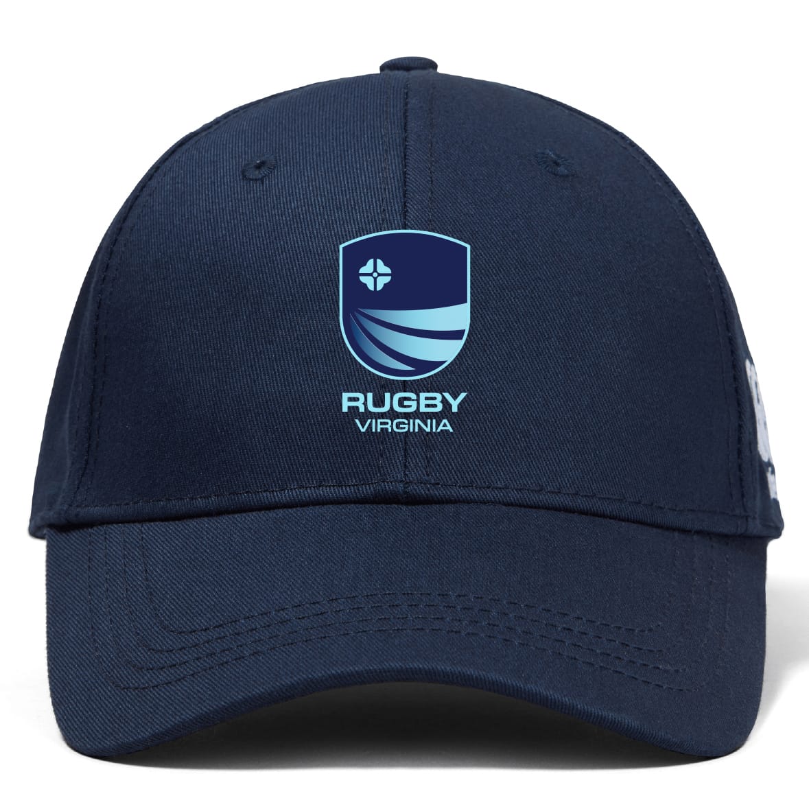 The Rugby VA Flexfit Drill Cap by EMB Canterbury is a navy blue cap with a blue and white shield logo and "RUGBY VIRGINIA" embroidered on the front.