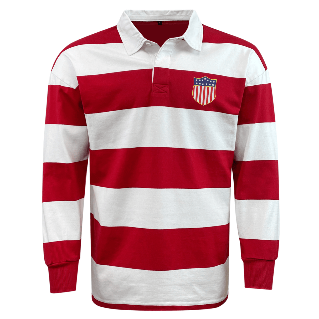 The EMB Mudoo USA Rugby Original Olympic 50th Anniversary Hooped Classic Jersey features bold red and white stripes and a stars-and-stripes crest, commemorating 50 years of USA Rugby in classic long-sleeve style.