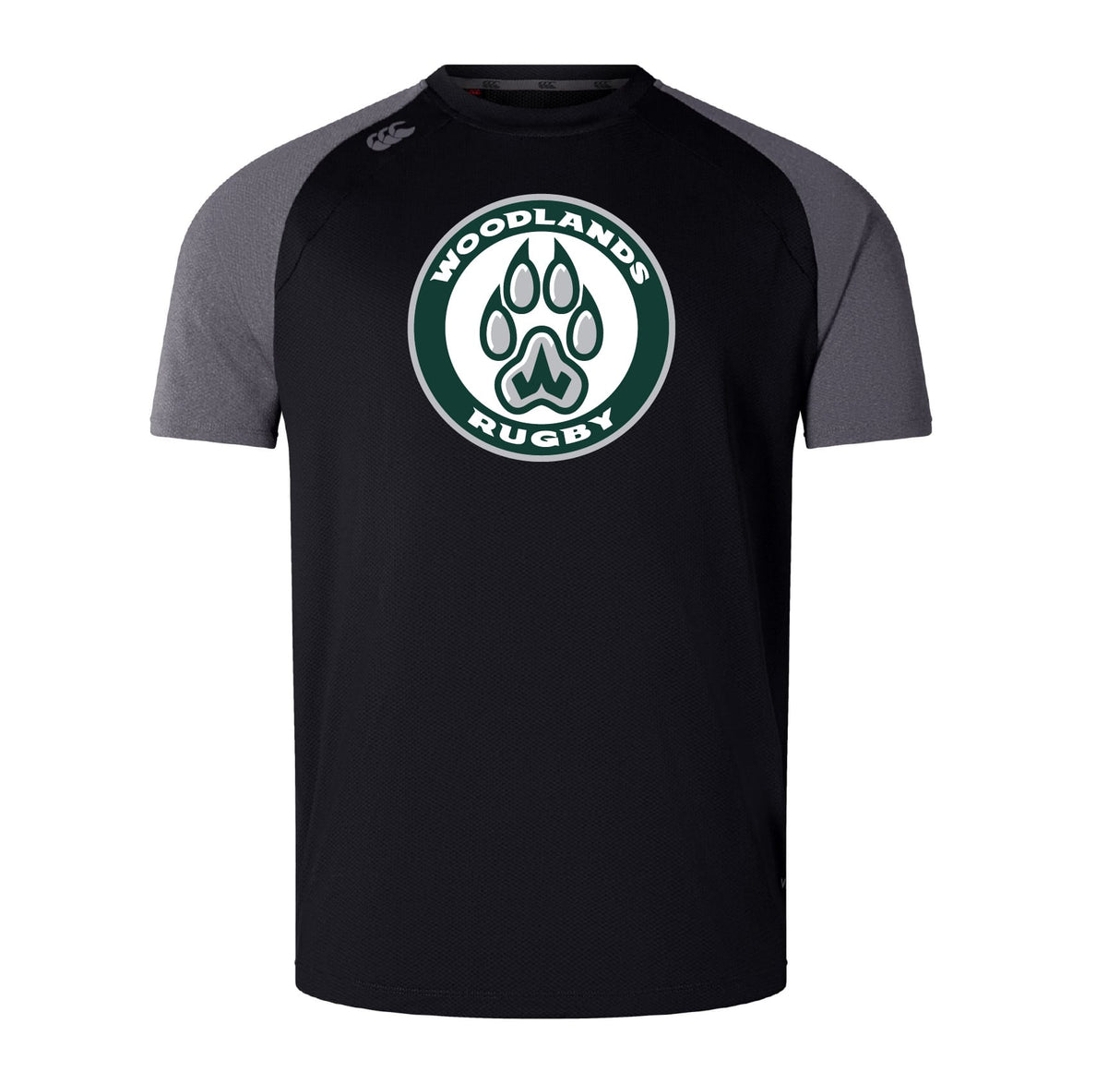 The Woodlands Youth Elite Training Tee by WRS Canterbury features black and gray short sleeves, a bold "Woodlands Rugby" chest logo with paw print, and is made from lightweight Vapodri fabric for comfort and performance.