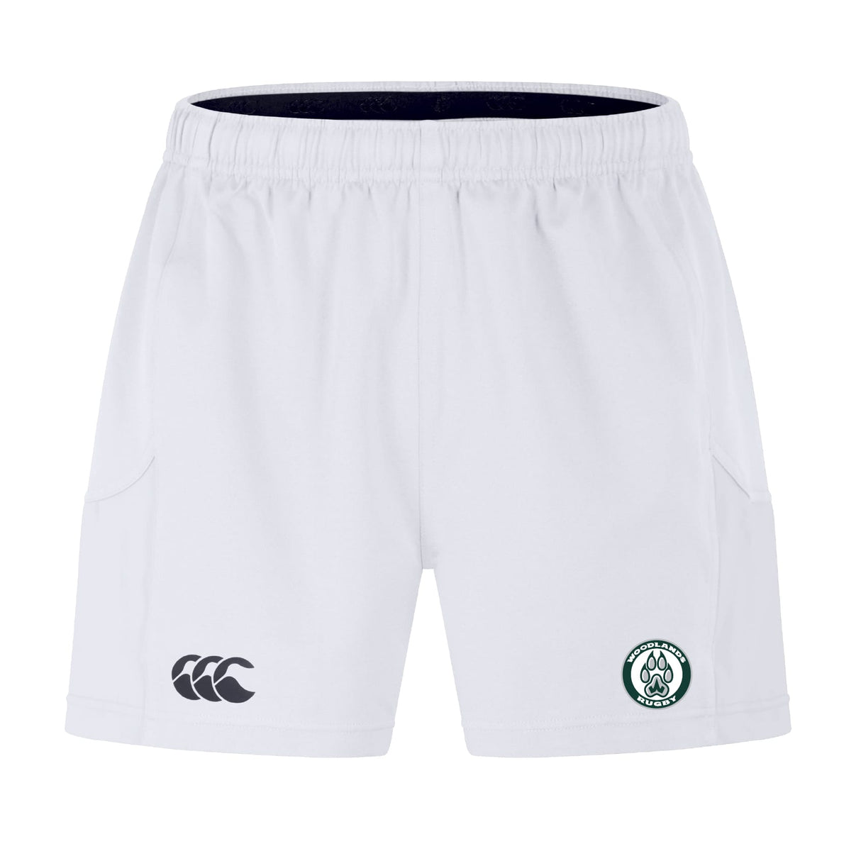 The Woodlands Youth Advantage Short 2.0 by EMB Canterbury features an elastic waistband, two side pockets, a black logo on the left leg, and a green/white emblem on the right. Perfect sustainable athletic shorts for active kids.