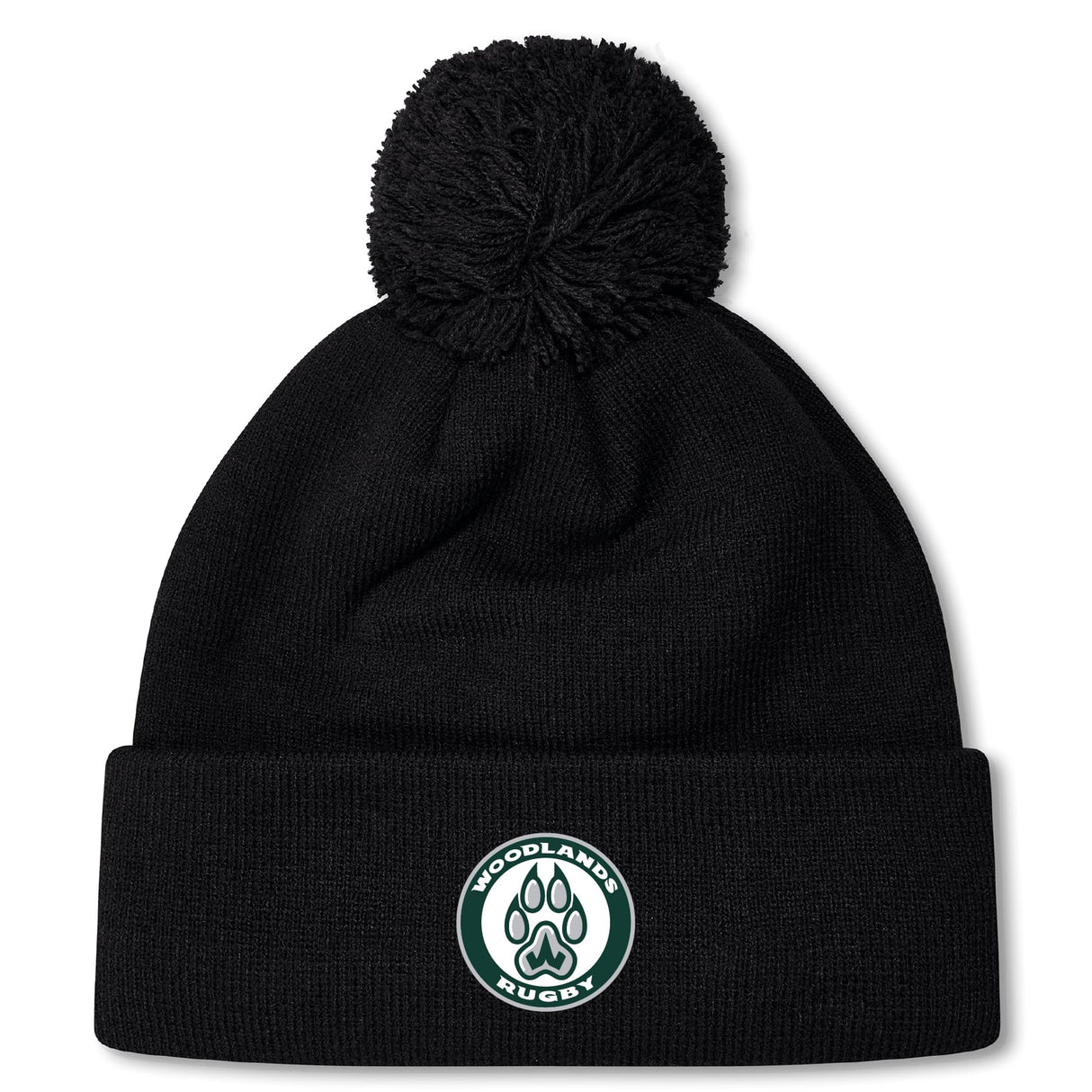 The Woodlands Youth Pom Pom Beanie by EMB Canterbury is a black, fleece-lined hat with a pom-pom and a "Woodlands Rugby" paw print logo patch—perfect for keeping warm at chilly rugby games.