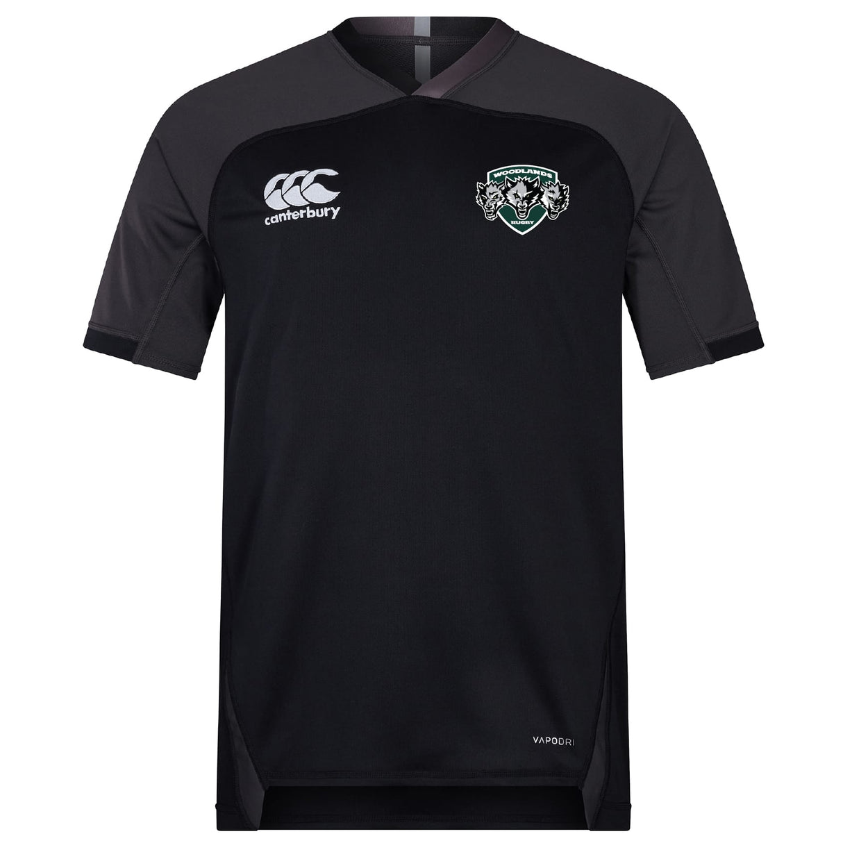 The Woodlands Youth Wolfpack Vapodri Evader Jersey by EMB Canterbury features black and dark grey colors, short sleeves, a brand logo on the right chest, team crest on the left, and moisture-wicking fabric for comfort during play.