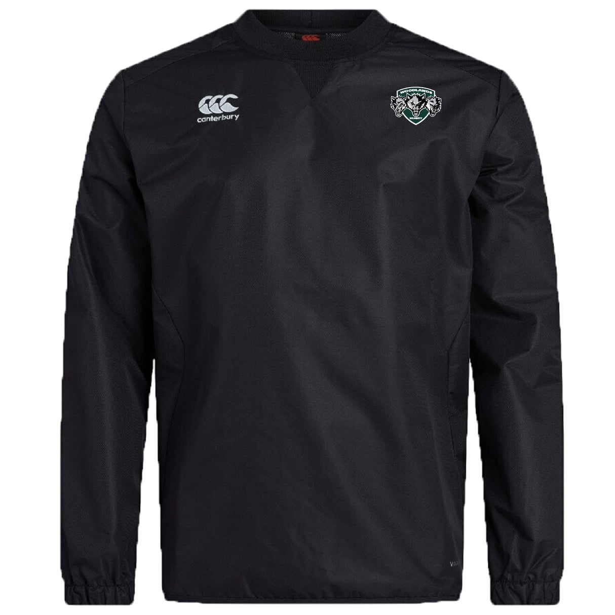The EMB Canterbury Woodlands Youth Wolfpack Club Vaposhield Contact Top features a black, long-sleeve design with the Canterbury logo on the right chest, green and white team crest on the left, and water-resistant Vaposhield technology.