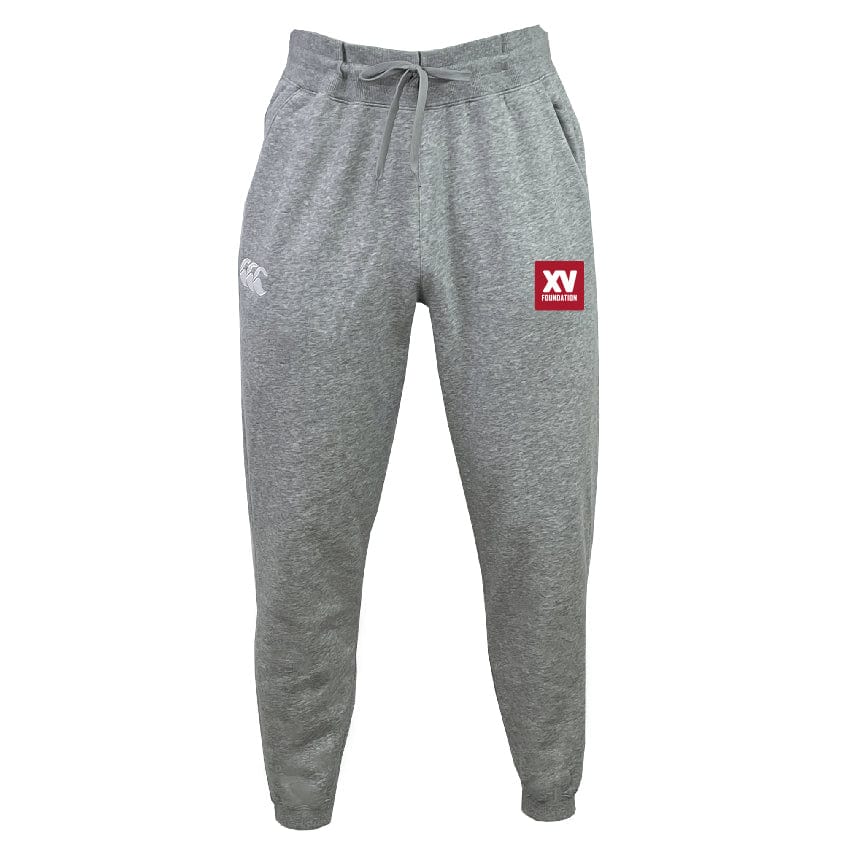 The XV Foundation Leisure Sweatpant by EMB Canterbury features a drawstring waist, organic cotton fabric, a white logo on the left thigh, and a red "XV RUGBY" patch on the right thigh.