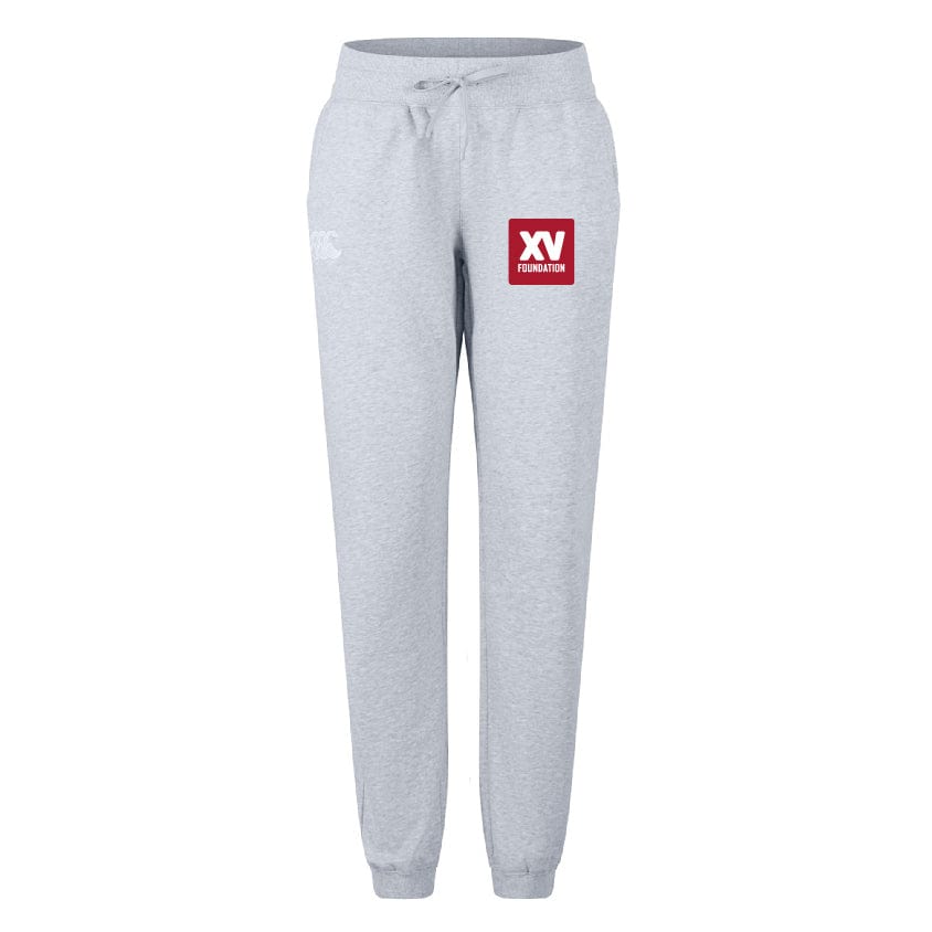The XV Foundation Women's Leisure Sweatpant by EMB Canterbury features a light grey organic cotton fabric, drawstring waist, ribbed cuffs, and a red and white "XV Foundation" logo on the left thigh.