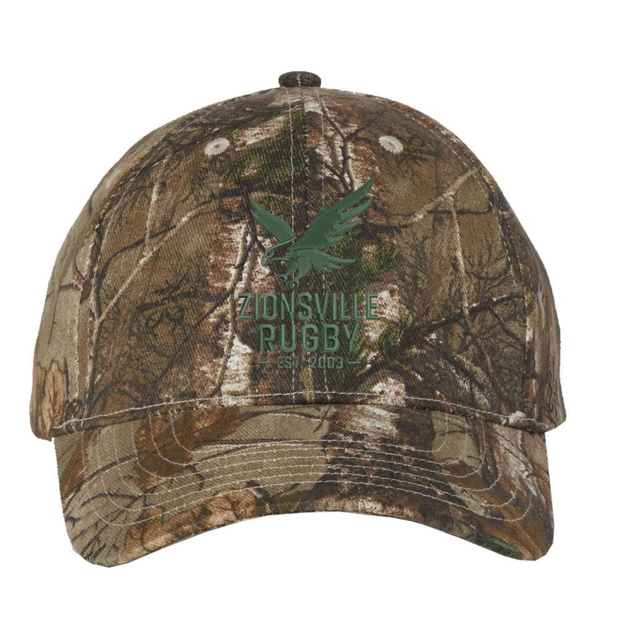 Sport your Zionsville Rugby pride with the Zionsville Rugby Camo Cap - Realtree Extra from EMB S&S Activewear. This cap features a striking green eagle embroidered team logo and “Zionsville Rugby Est. 2003” on the front, combining classic rugby spirit with rugged Realtree camo style—ideal for any devoted supporter.
