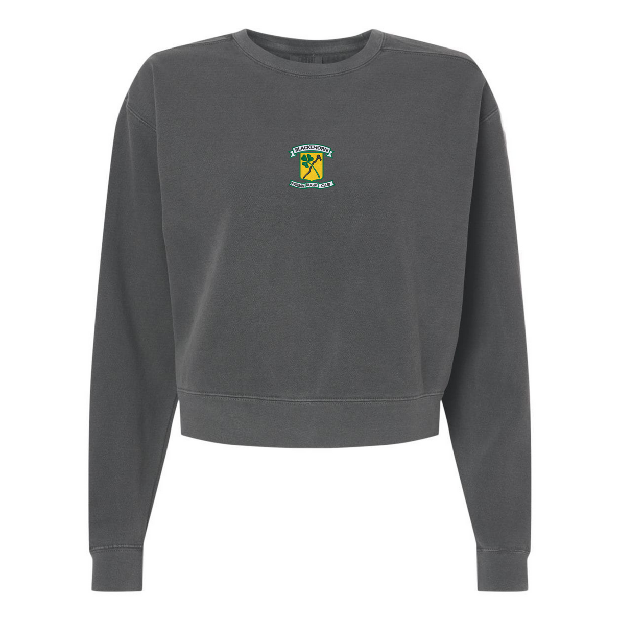 The EMB S&S Activewear Women's Blackthorn Rugby Mid-Length Crewneck Sweatshirt is cropped, garment-dyed charcoal gray, and displays a small colorful crest logo on the chest against a white background.