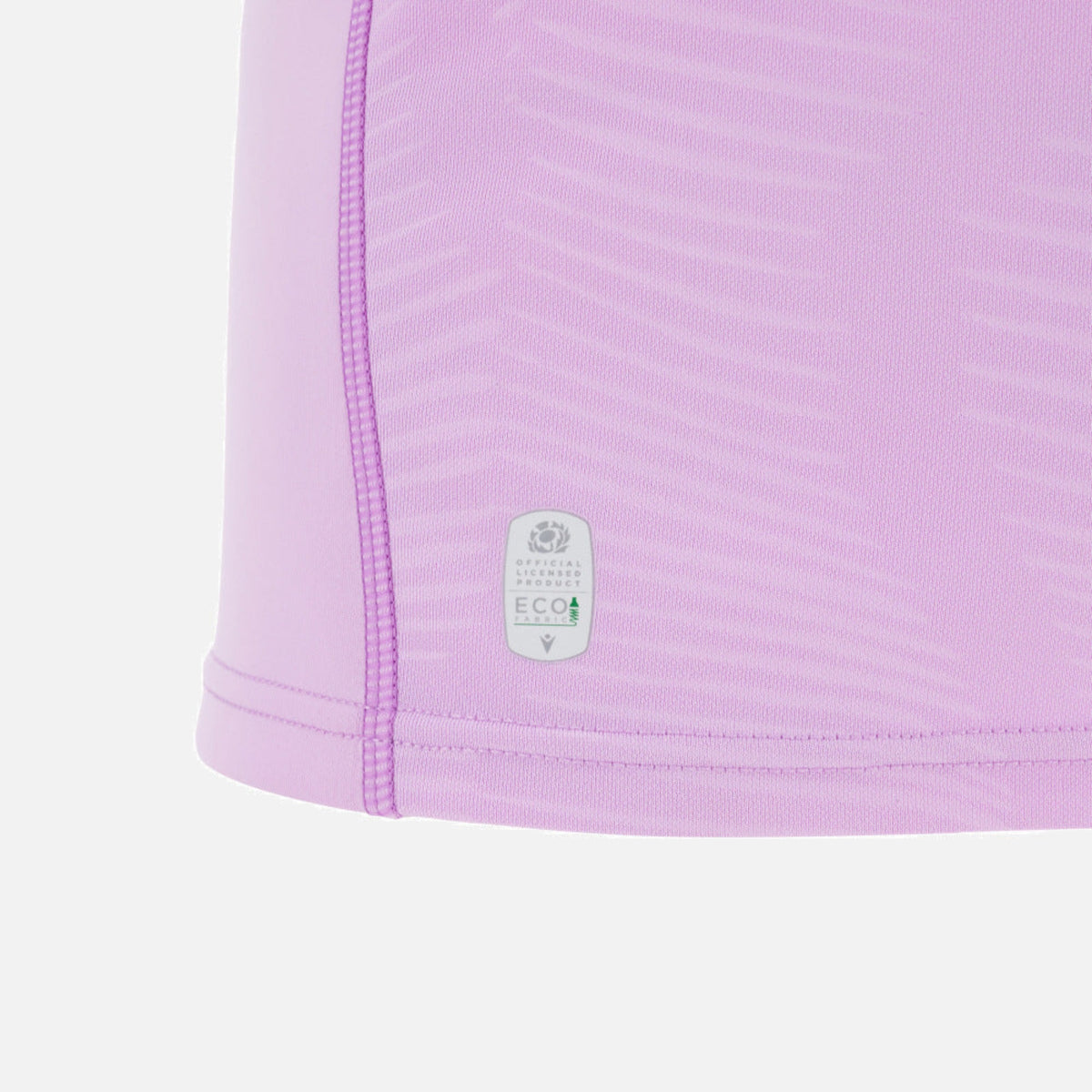 Close-up of the lower side of the light purple Scotland 25/26 Replica Away Jersey by Macron, showing visible stitching and an "ECOA" label that highlights its eco-friendly materials.