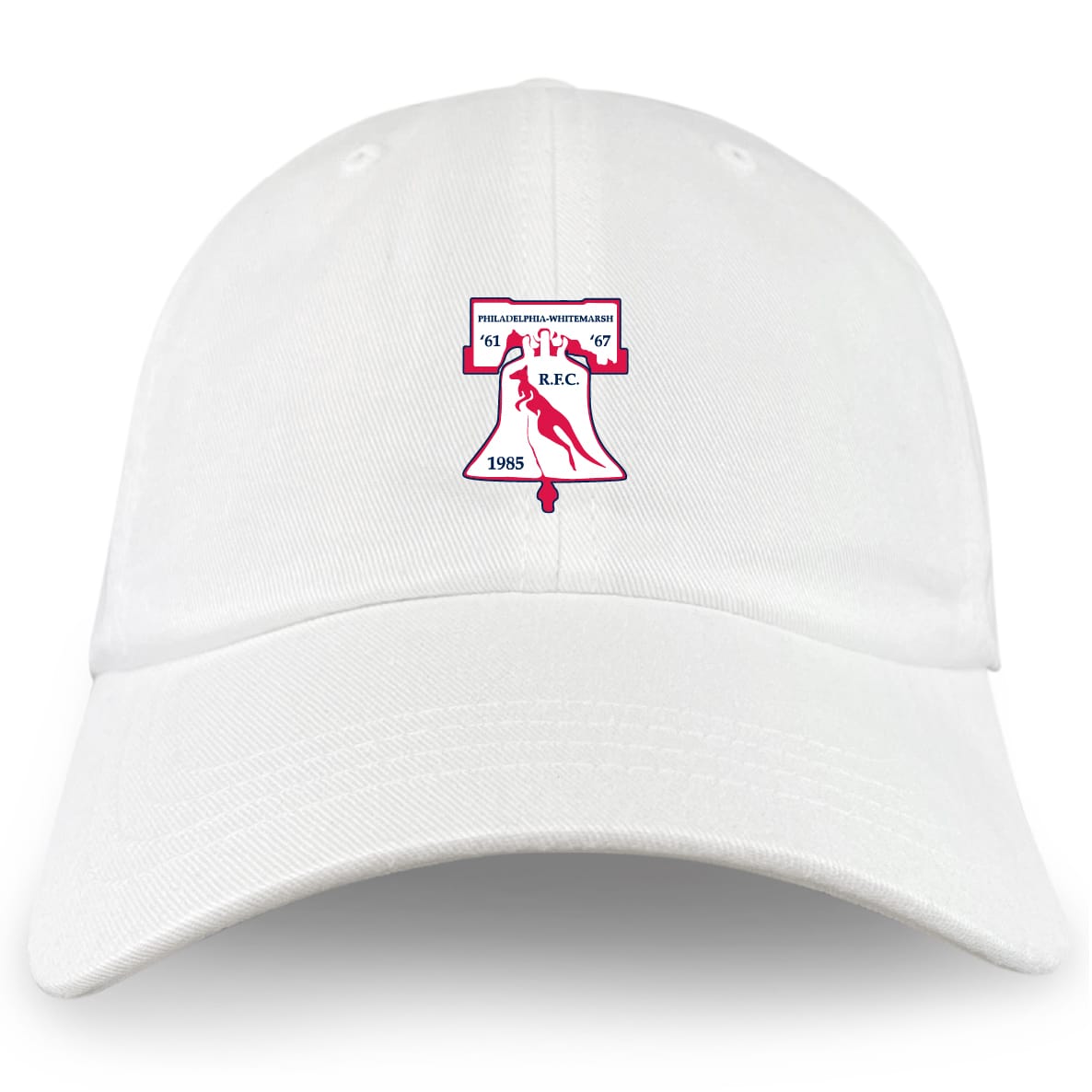 The Philly Whitemarsh RFC Adult Low-Profile Cotton Twill Dad Cap by EMB S&S Activewear features a classic white design with an embroidered red and white crest showing a bell, rugby player, and "Philadelphia Whitemarsh R.F.C. 1985.