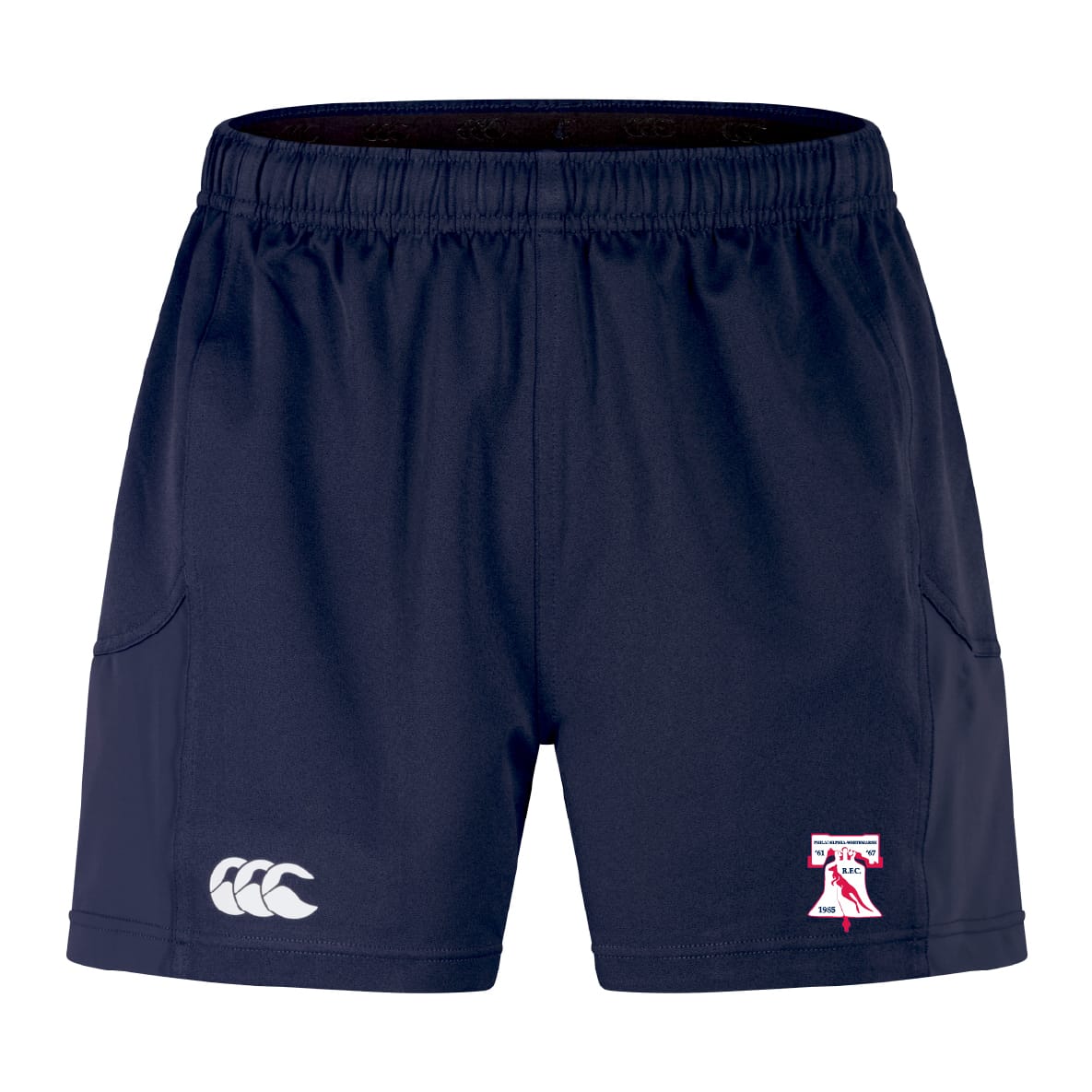 The Philly Whitemarsh RFC Advantage Short 2.0 by EMB Canterbury features navy blue performance fabric, a Canterbury logo on the left leg, a red and white team emblem on the right, and is made with recycled content for sustainability.